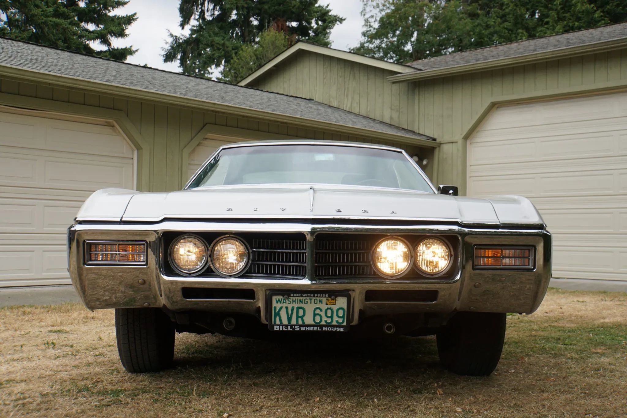 Vintage Car Life Review: 1969 Buick Riviera With Accu-Drive – Buick Tries Something New In The Suspension Department 18 Front view of a 1969 Buick Riviera with its headlights on