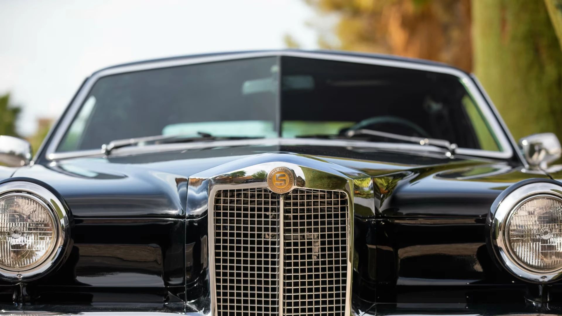 Closeup of the grille of a black 1971 Stutz