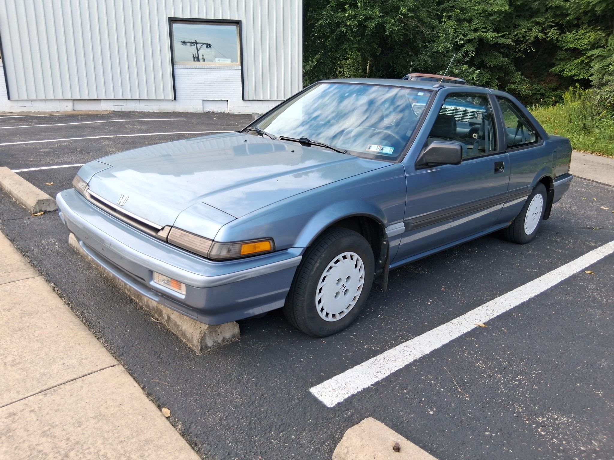 1988/1989 Honda Accord DX Coupe: It Gets My Vote For The Best-Looking Honda 1 Driver front 3q picture of blue Honda Accord DX coupe in a blacktop parking lot near a building