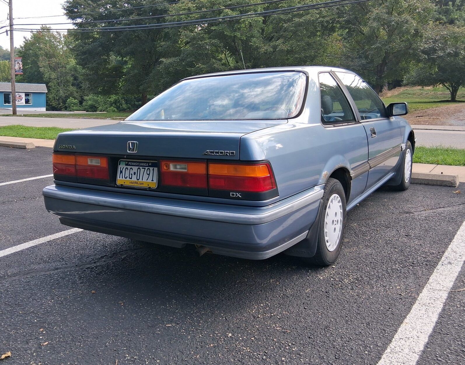 1988/1989 Honda Accord DX Coupe: It Gets My Vote For The Best-Looking Honda 4 Passenger rear 3q view of blue Honda Accord DX Coupe in parking lot