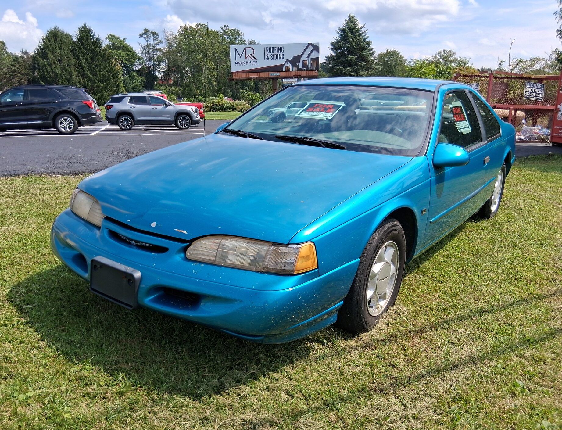1994 Ford Thunderbird LX: As Teal As You Remember It, But A Little Rustier 1 Driver front 3q picture of teal 1994 Ford Thunderbird LX with a For Sale sign