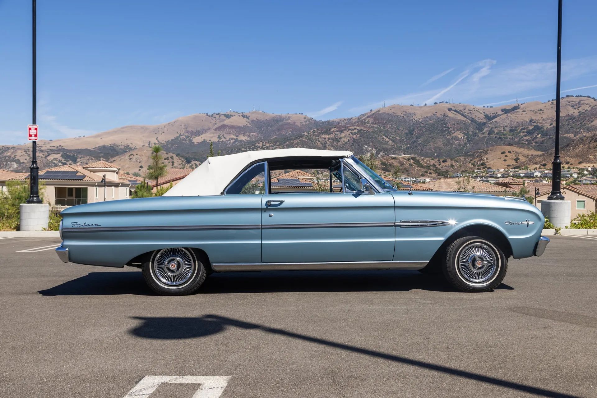 1963 Ford Falcon Sprint Convertible: A Soft Open For The Mustang 7 Passenger side profile view of blue 1963 Ford Falcon Sprint Convertible with white convertible top