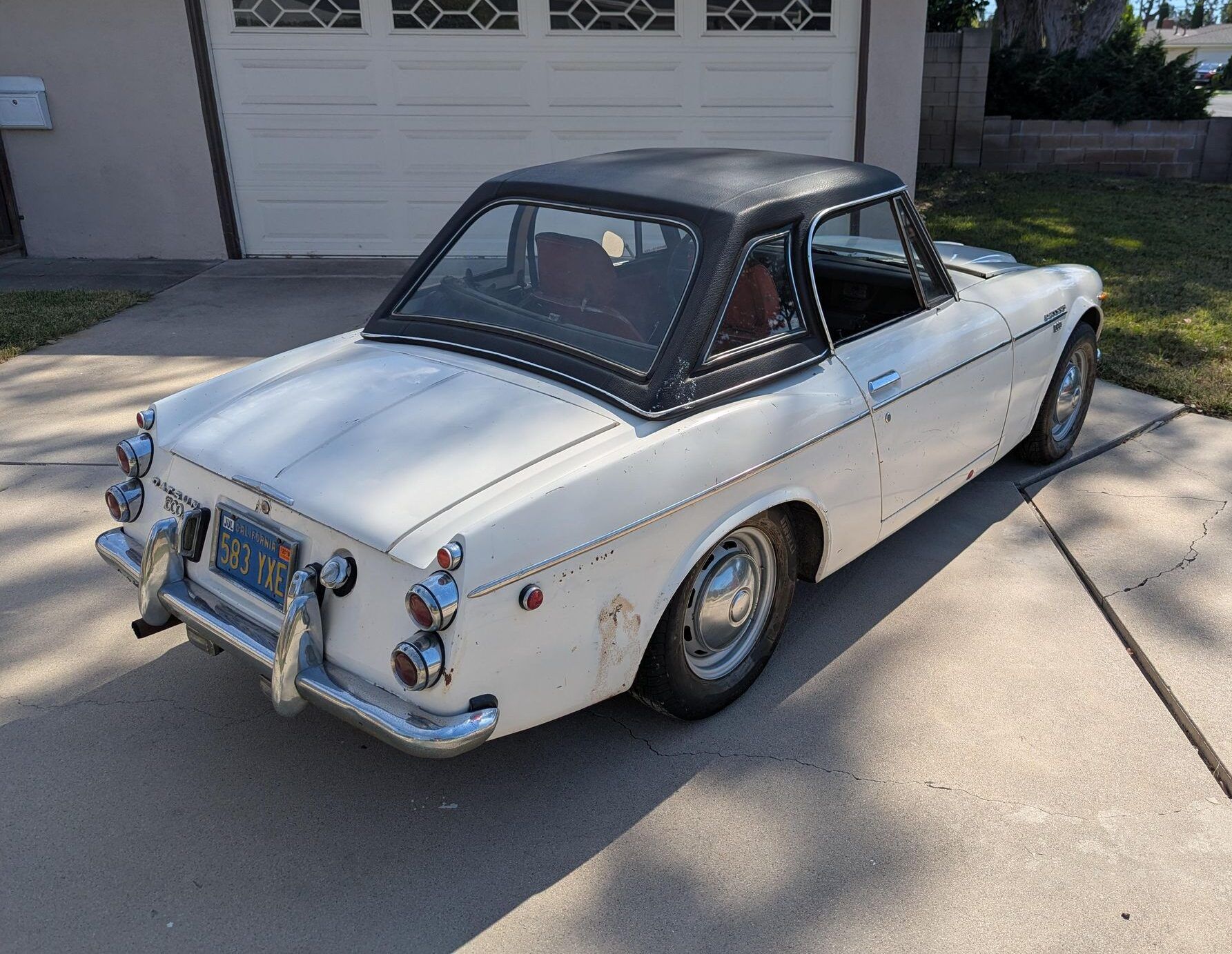 1969 Datsun 1600 Roadster: A Fun Winter Project With A Pile Of Spare Parts 7 Passenger rear 3q picture of white 1969 Datsun 1600 Roadster
