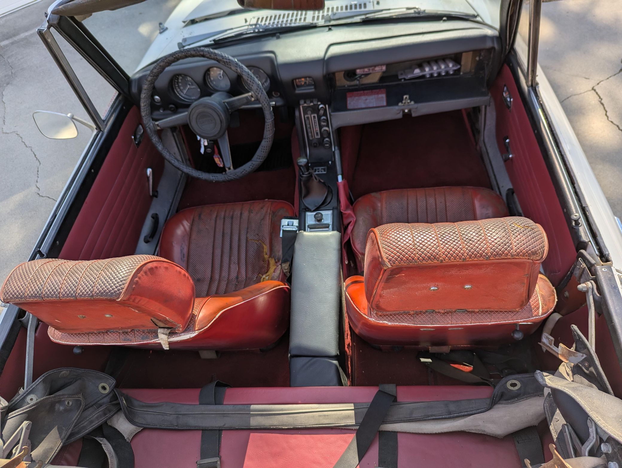 1969 Datsun 1600 Roadster: A Fun Winter Project With A Pile Of Spare Parts 4 1969 Datsun 1600 Roadster interior with red upholstery