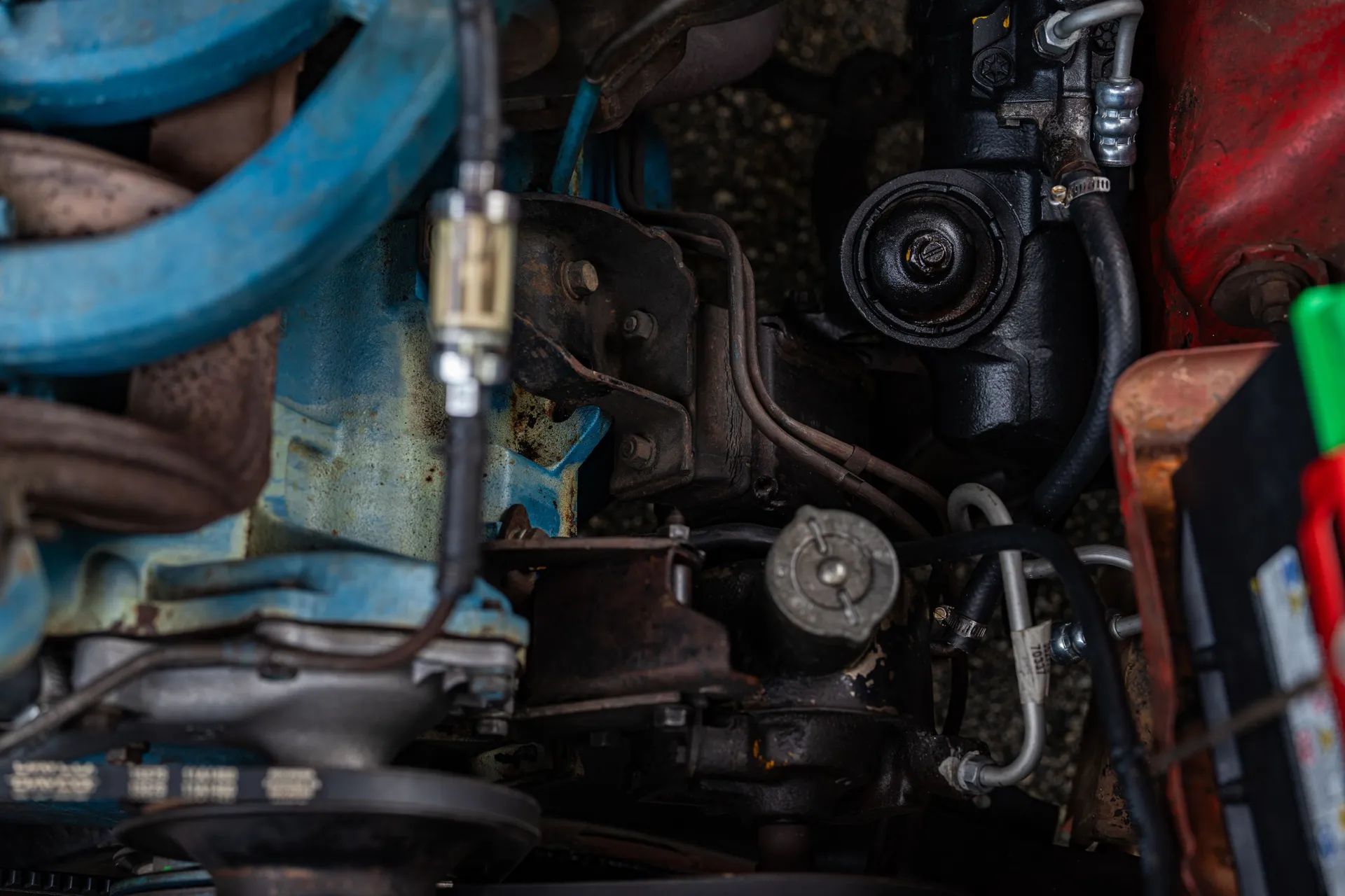 1970 Plymouth Barracuda engine compartment showing power steering pump and gear