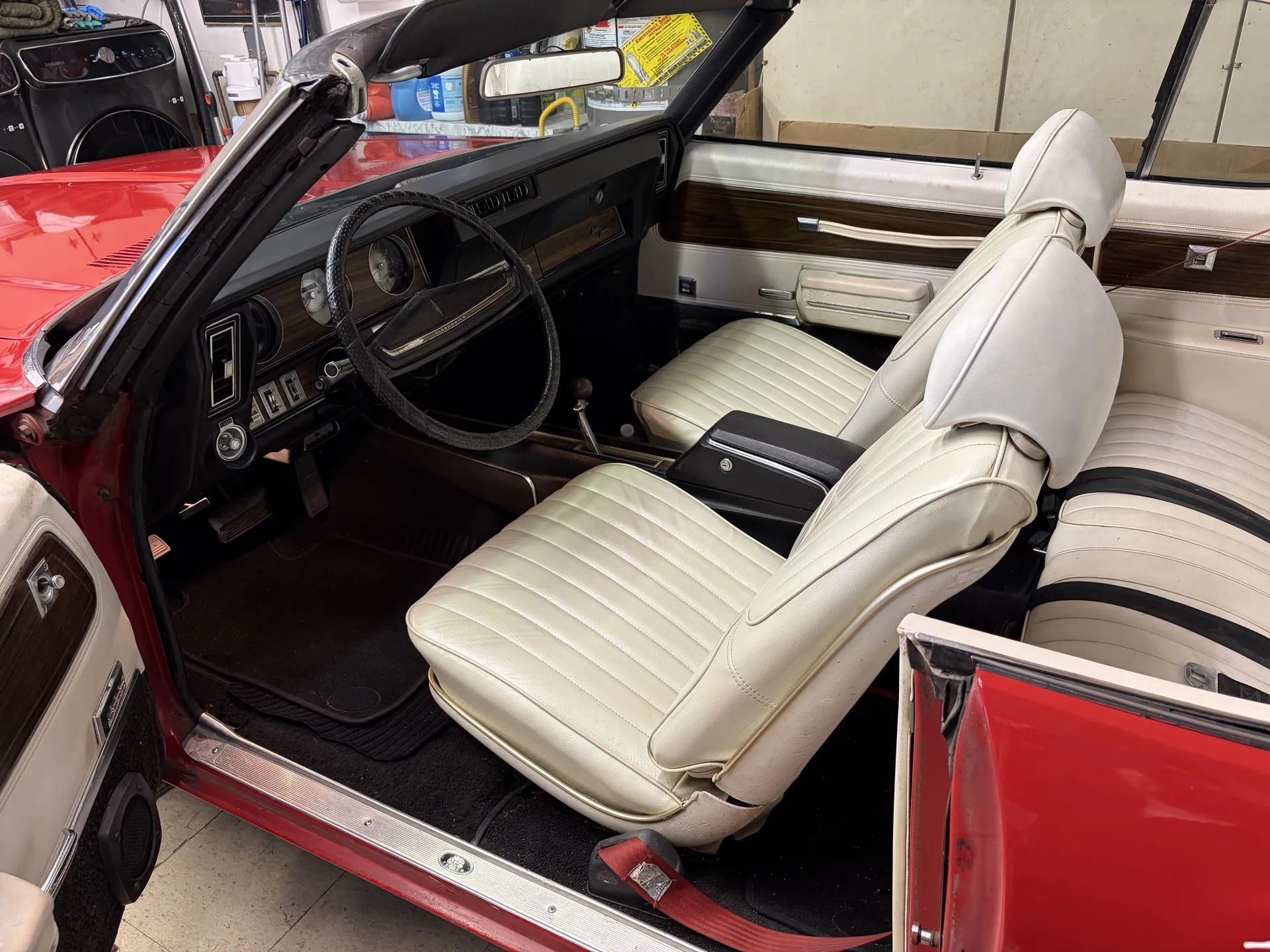 1971 Oldsmobile Cutlass Supreme Convertible: A Solid Driver With Only 82,000 Miles 5 Interior of 1971 Oldsmobile Cutlass Supreme Convertible with white bucket seats and black carpet