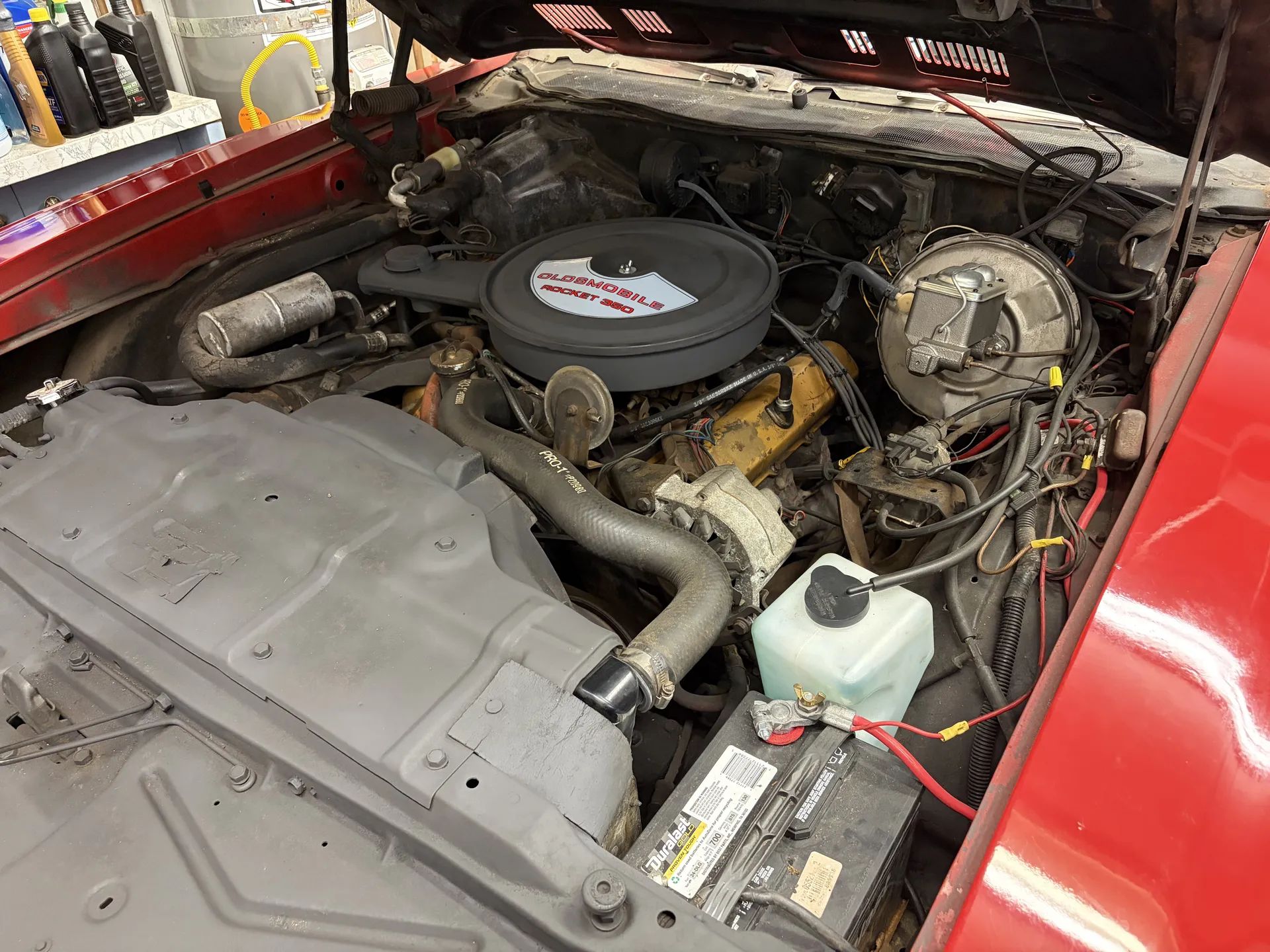 1971 Oldsmobile Cutlass Supreme Convertible: A Solid Driver With Only 82,000 Miles 4 Engine compartment of red 1971 Oldsmobile Cutlass Supreme Convertible with "Rocket 350"