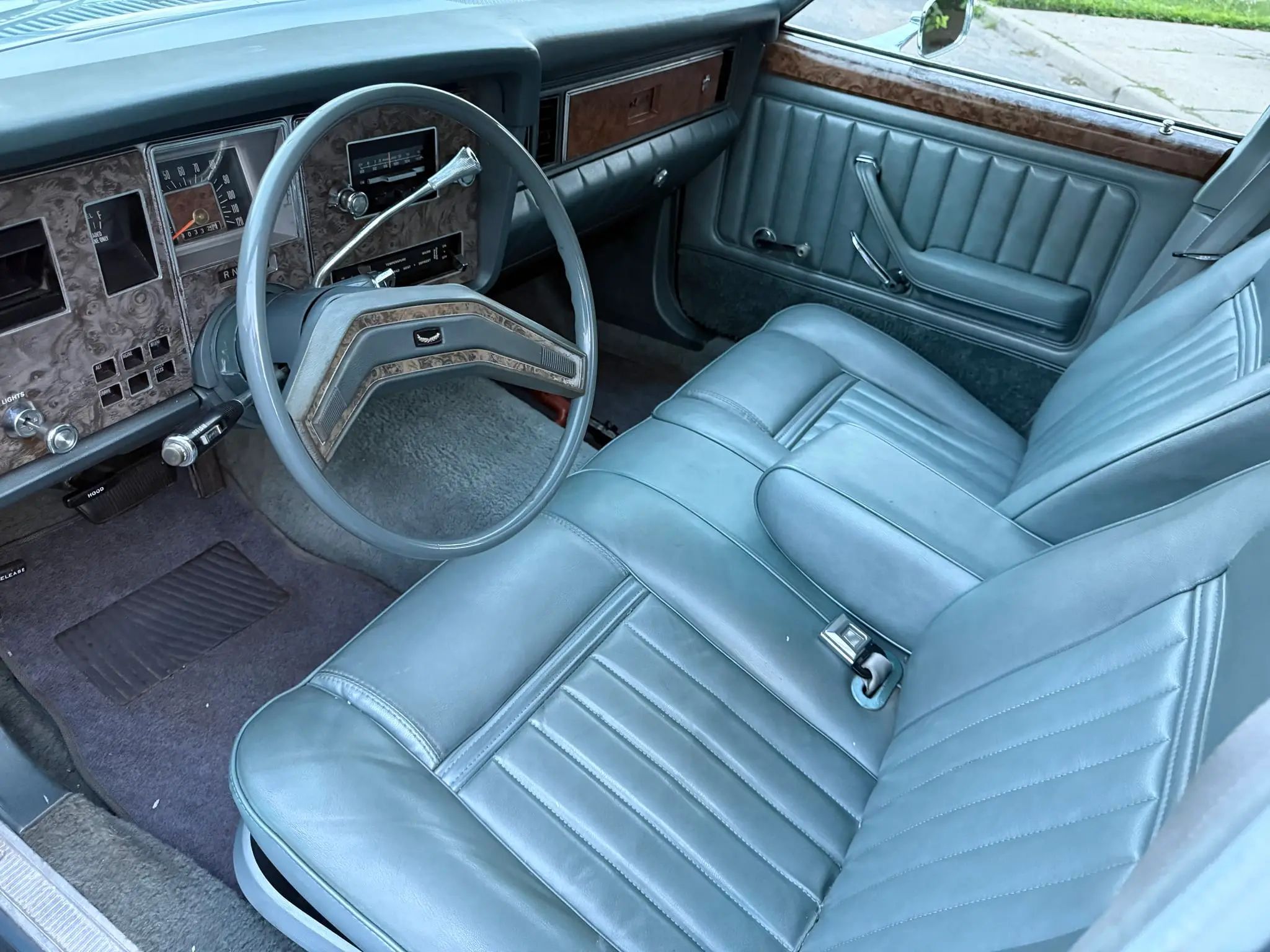 Silver interior in 1976 Mercury Monarch Ghia Sedan