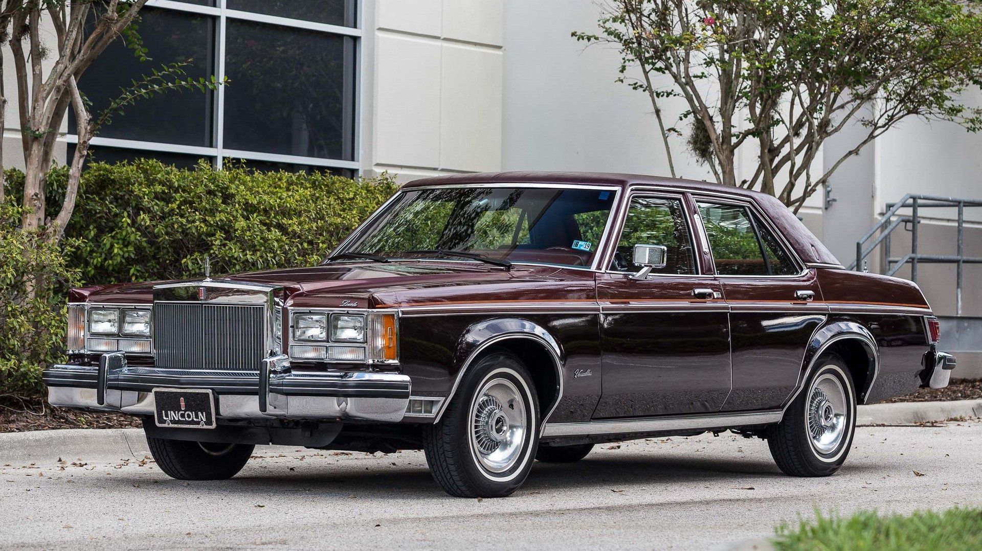 Front driver 3q picture of maroon 1977 Lincoln Versailles