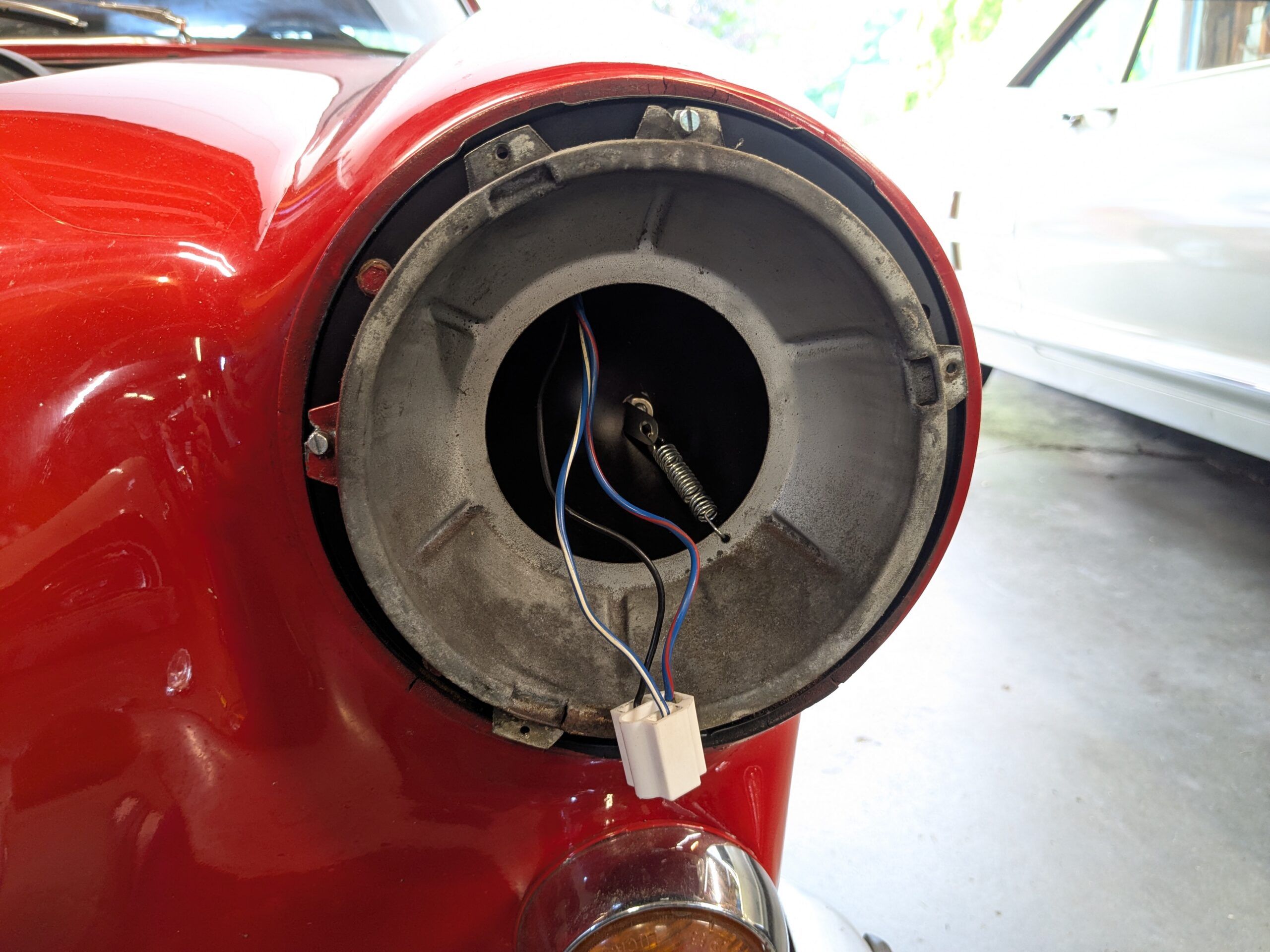 My 1967 Volvo 1800S: A Year After Its Purchase, I No Longer Completely Regret It 3 1967 Volvo 1800S headlight bucket