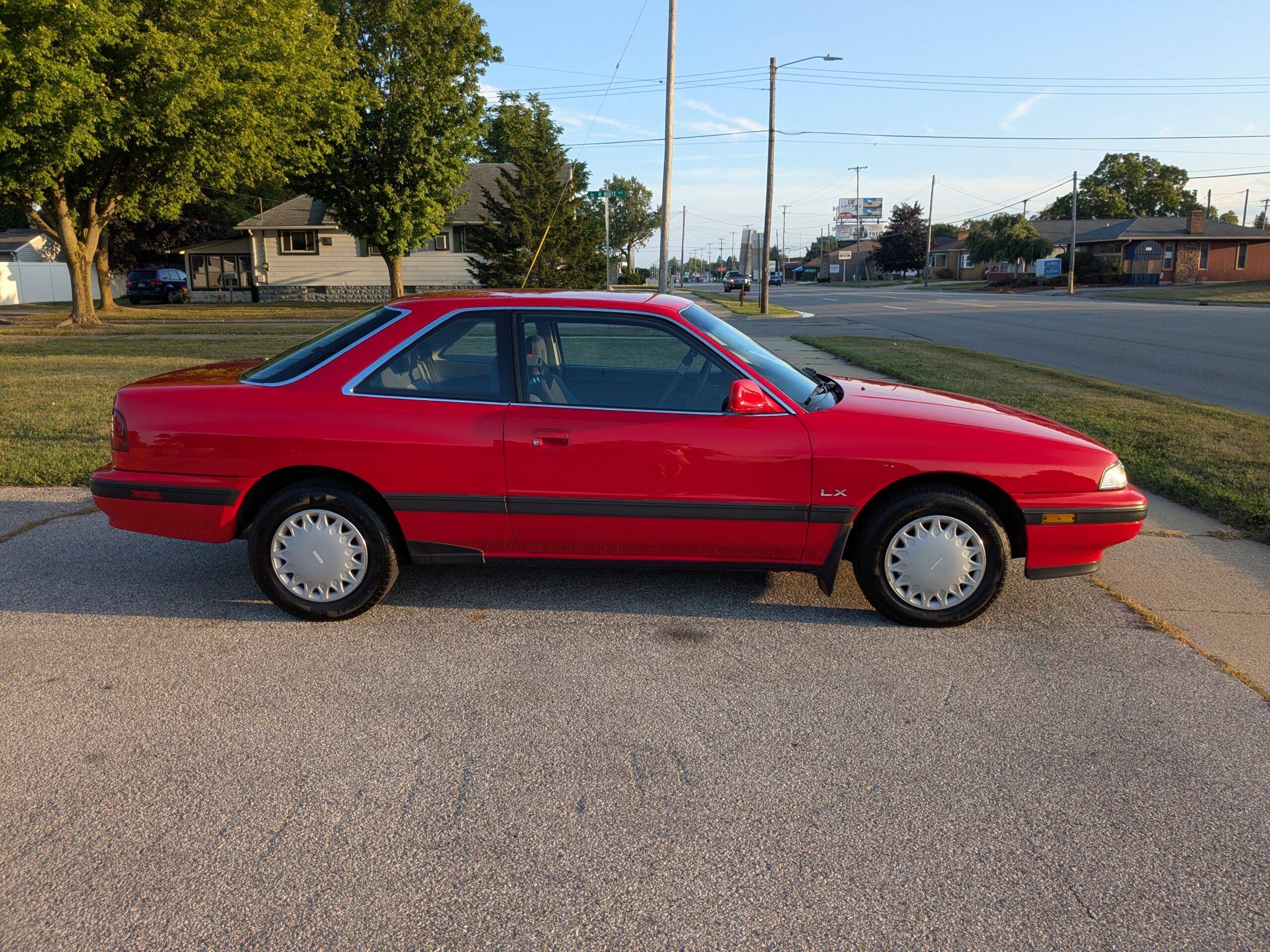 1991 Mazda MX-6 LX: In An Alternate Universe, This Could Have Been The Mustang Notchback 4 Passenger side profile of red 1991 Mazda MX-6 LX