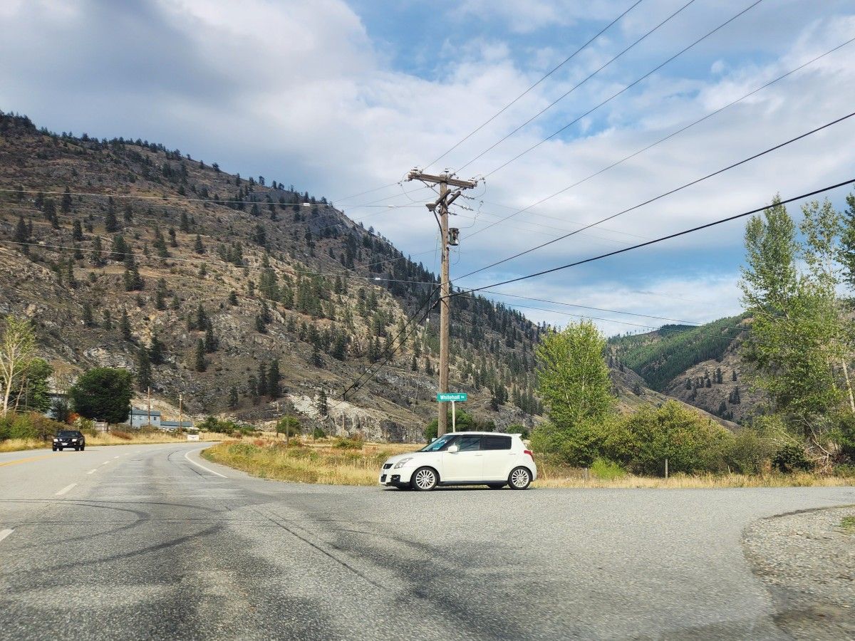 Suzuki Swift car at the roadside.