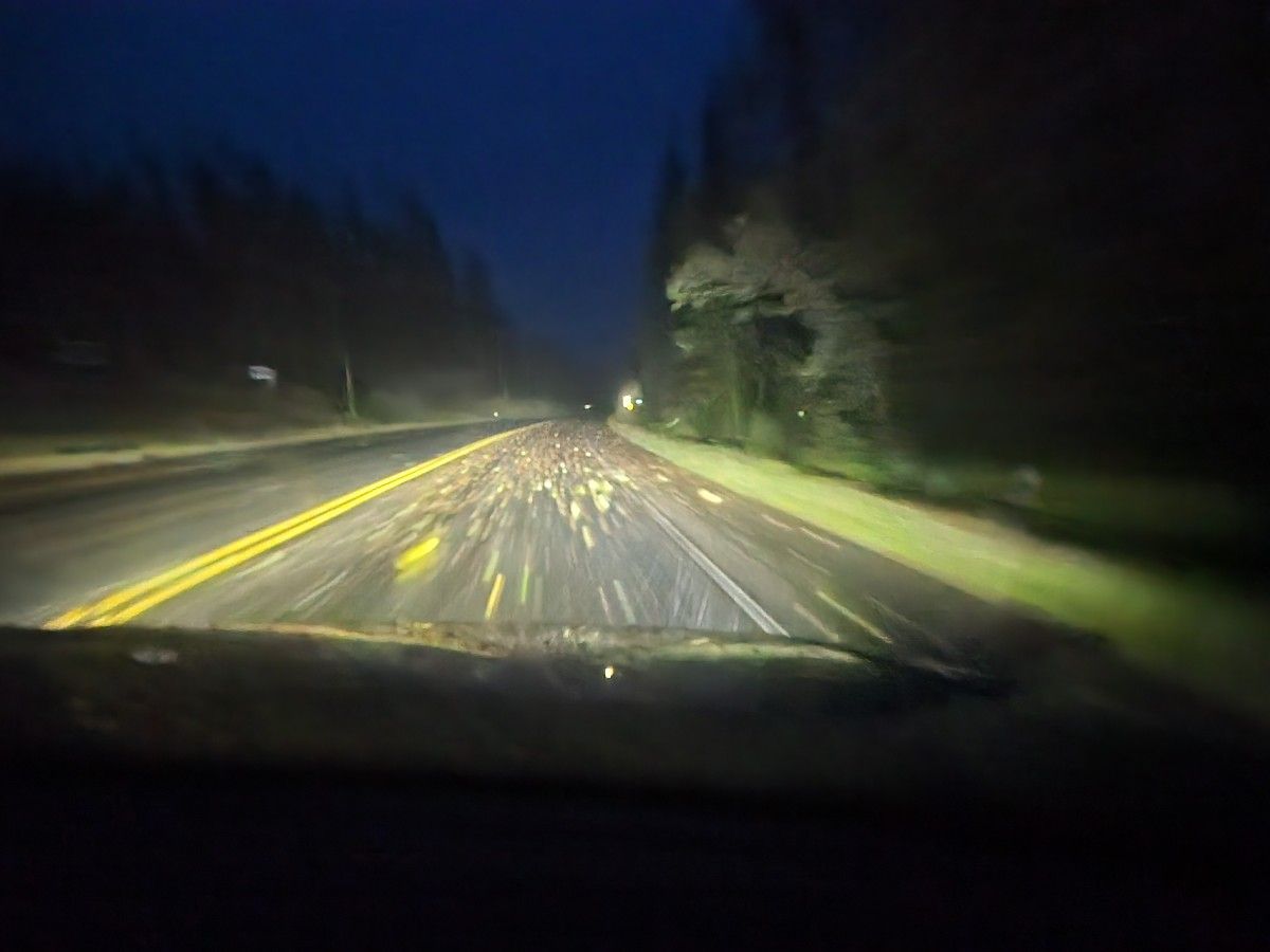 Dark and rainy road.