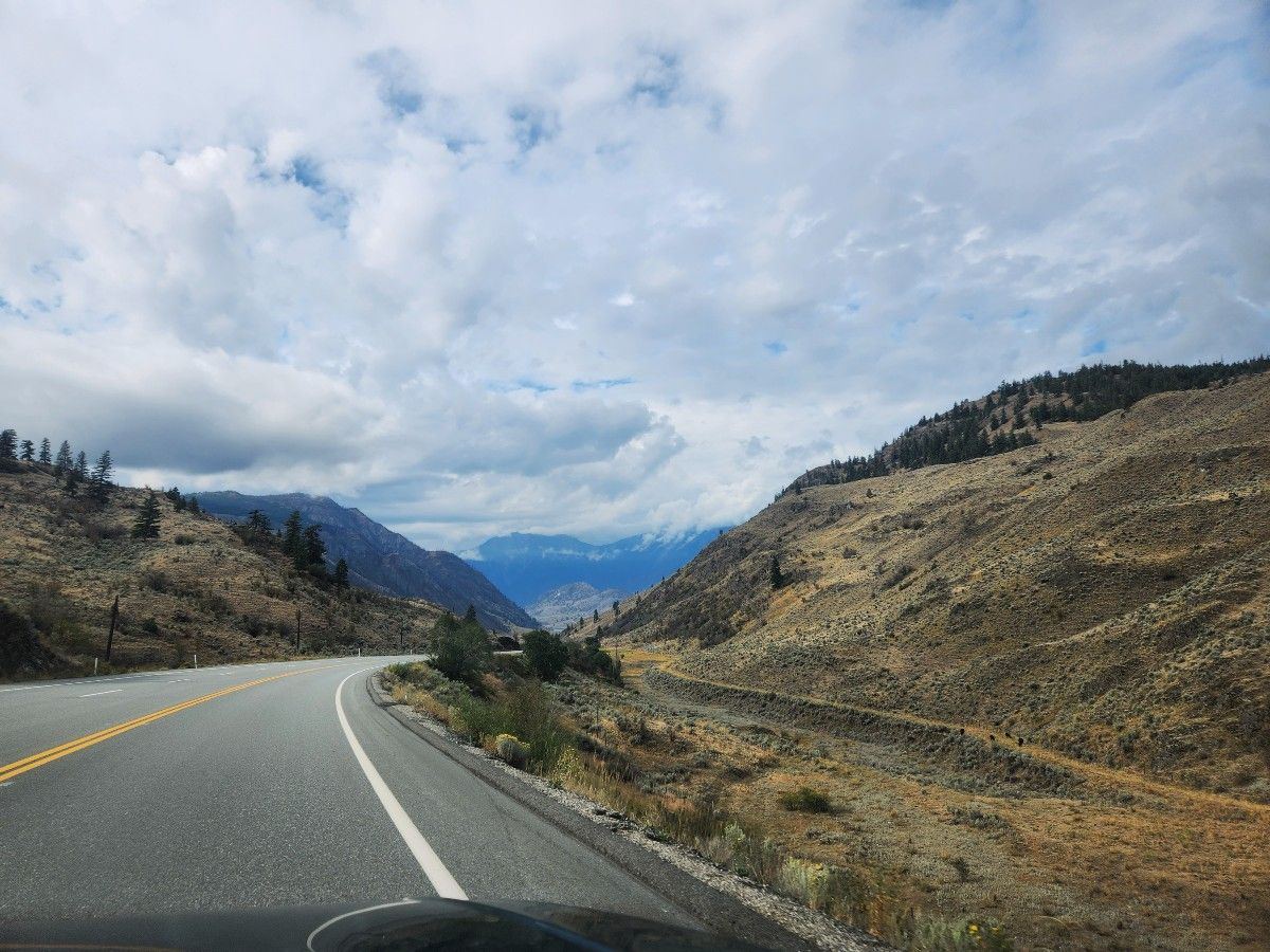 Mountain road of British Columbia from the passenger seat.