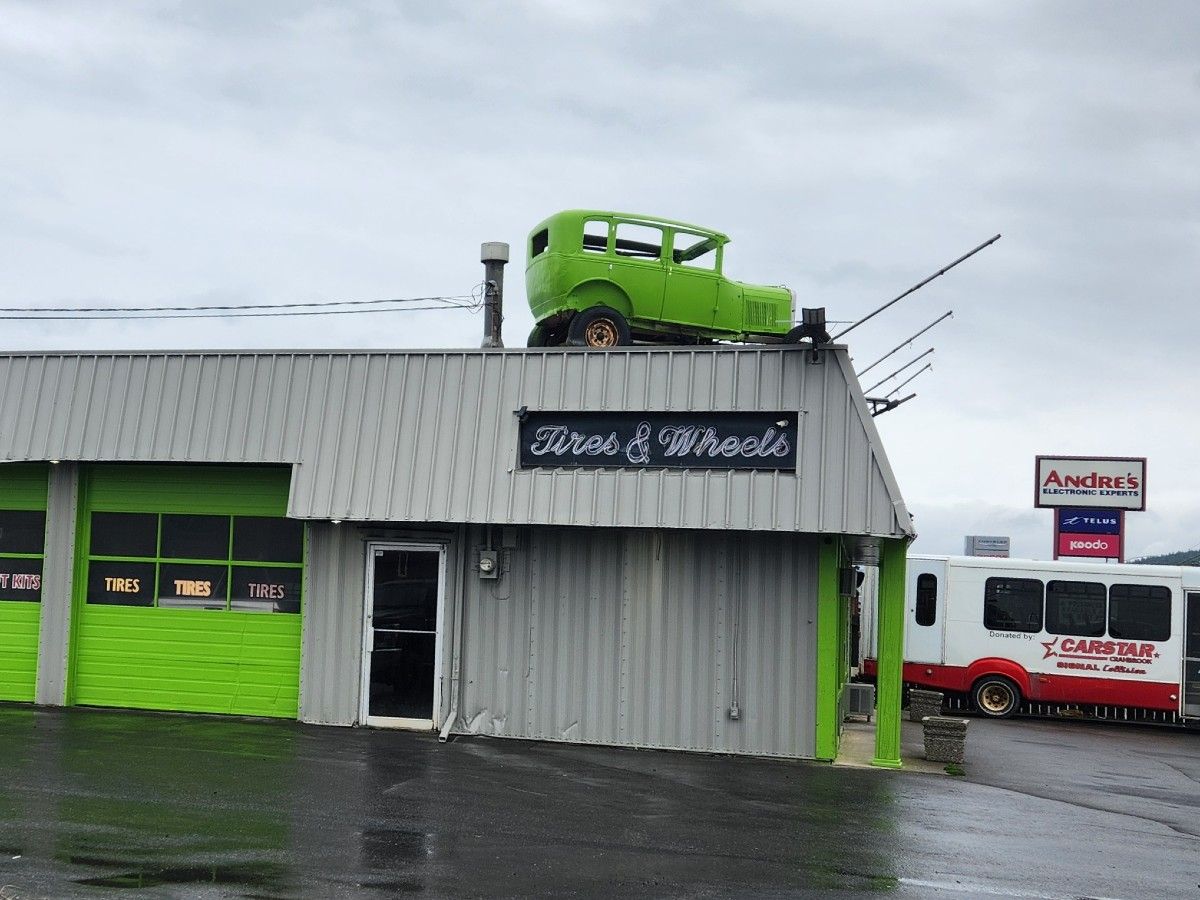 Old car made into sign.