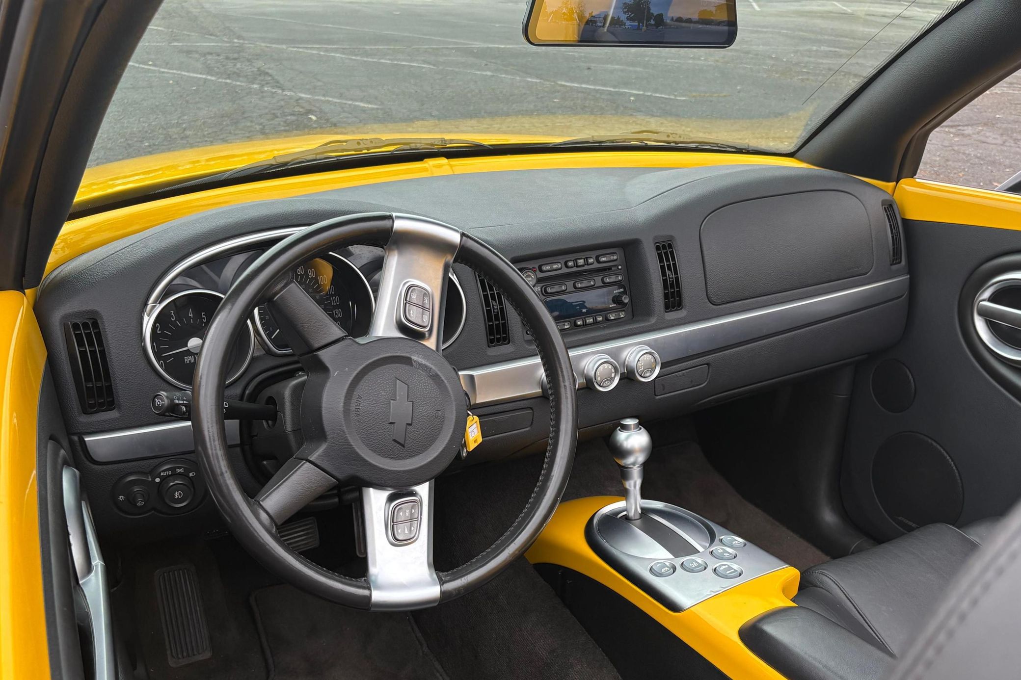 2004 Chevrolet SSR: A Convertible Two-Seater Truck? A Retro Curiosity Worth A Second Look 6 2004 Chevrolet SSR interior in yellow and black