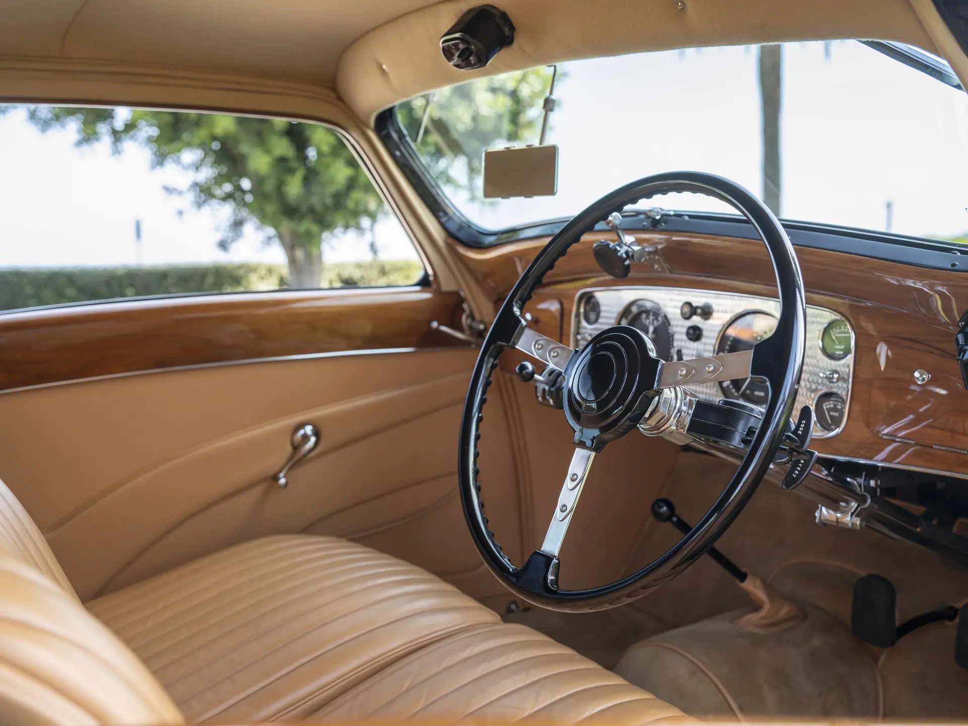 1970 Buick Riviera GS: This Unloved Riviera Was Inspired By A Spectacular Prewar Classic 5 Dashboard of a right-hand-drive 1937 Delage coupe with orange-brown leather upholstery