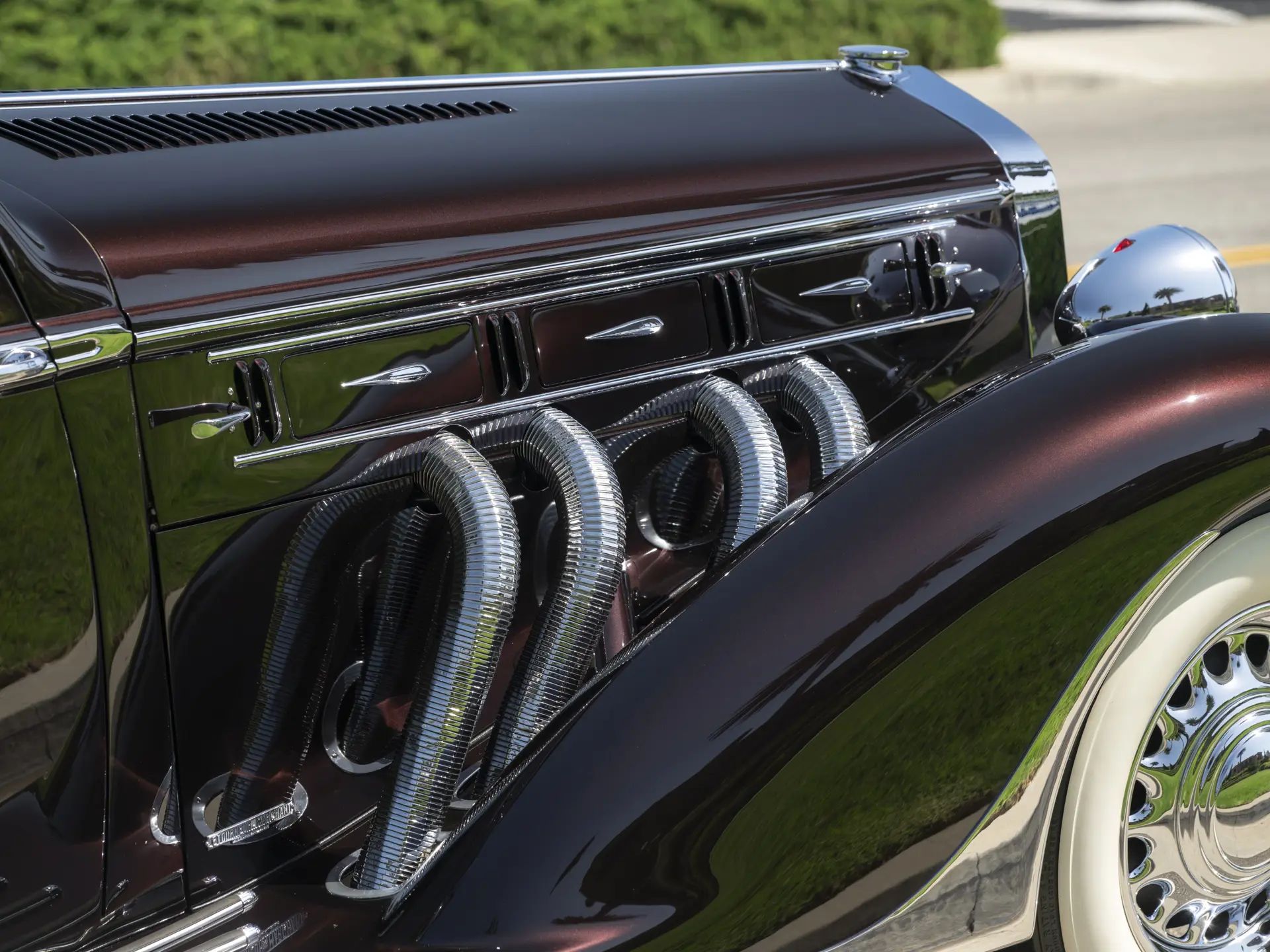 1970 Buick Riviera GS: This Unloved Riviera Was Inspired By A Spectacular Prewar Classic 3 Side of the hood of a burgundy 1937 Delage with external exhaust pipes