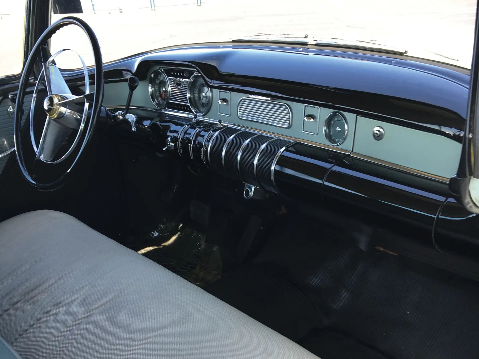Right side of the dashboard of a 1955 Buick