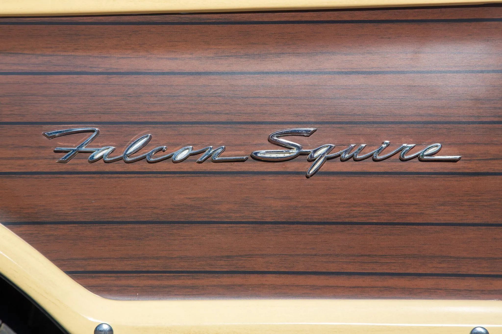 1963 Ford Falcon Squire V-8 Station Wagon: One Of Just 162 Falcon Wagons With The 260 V-8 And Bucket Seats 5 Falcon Squire badge on the fender of a 1963 Falcon wagon with woodgrain trim