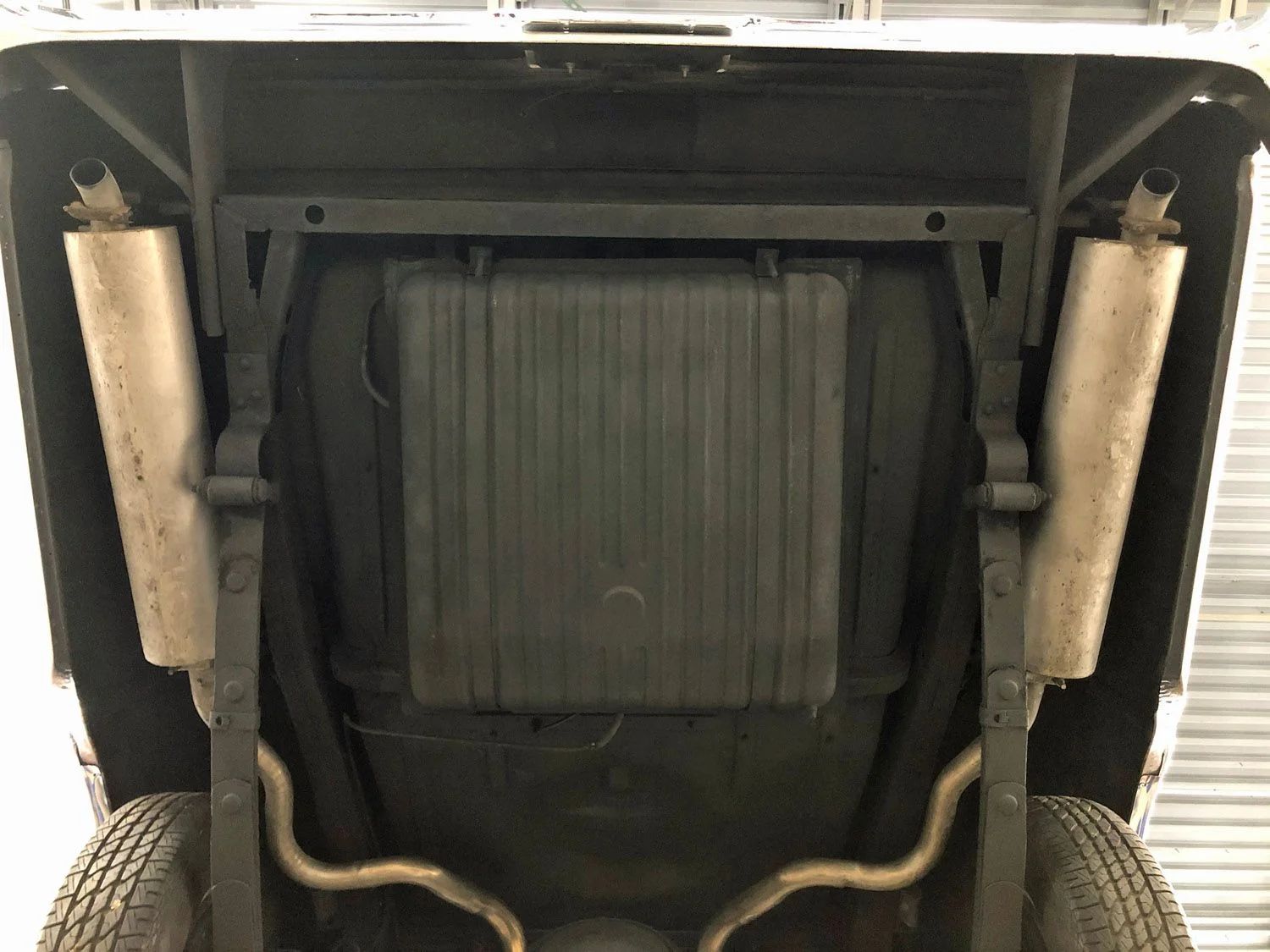 1963 Mercury Monterey S-55 Two-Door Hardtop: One-Year-Only Bucket-Seat Breezeway 28 Rear suspension and underbody of a 1963 full-size Mercury, seen from underneath