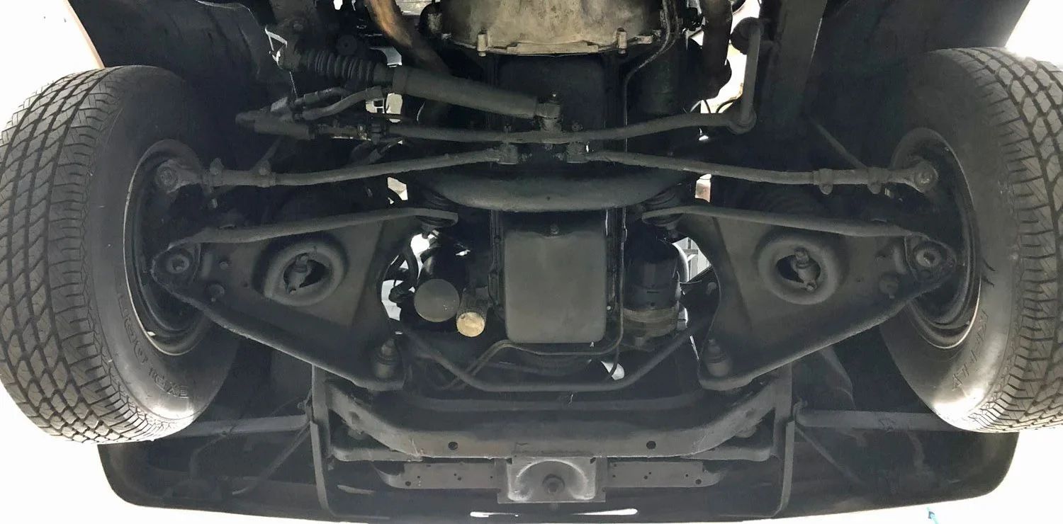 1963 Mercury Monterey S-55 Two-Door Hardtop: One-Year-Only Bucket-Seat Breezeway 30 Front suspension of a 1963 full-size Mercury, seen from underneath