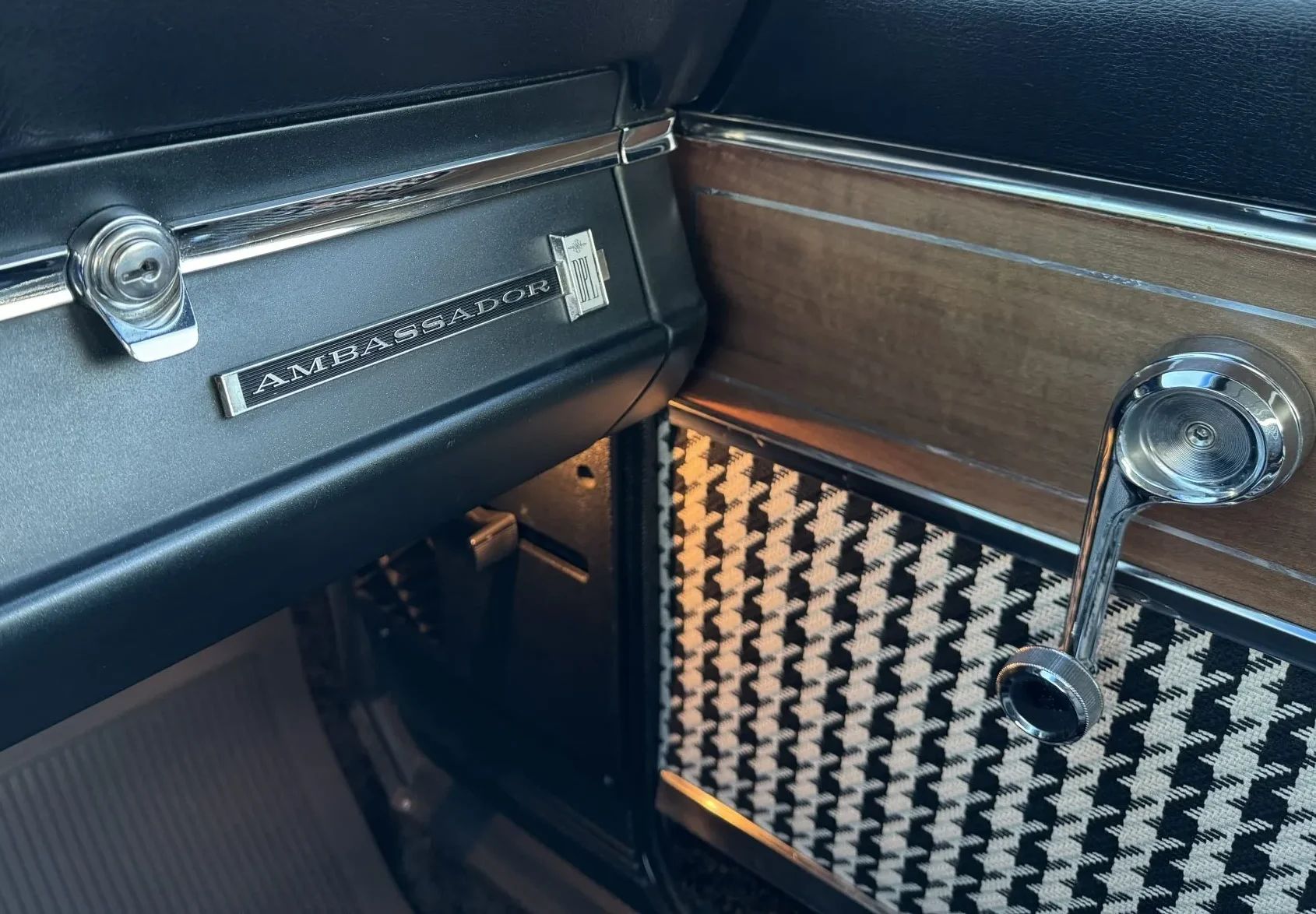 1966 AMC Ambassador DPL Hardtop: American's Dressed-Up Intermediate, Masquerading As A Full-Size Car 12 Glove box badge and wood door trim on the passenger side of a 1966 Ambassador