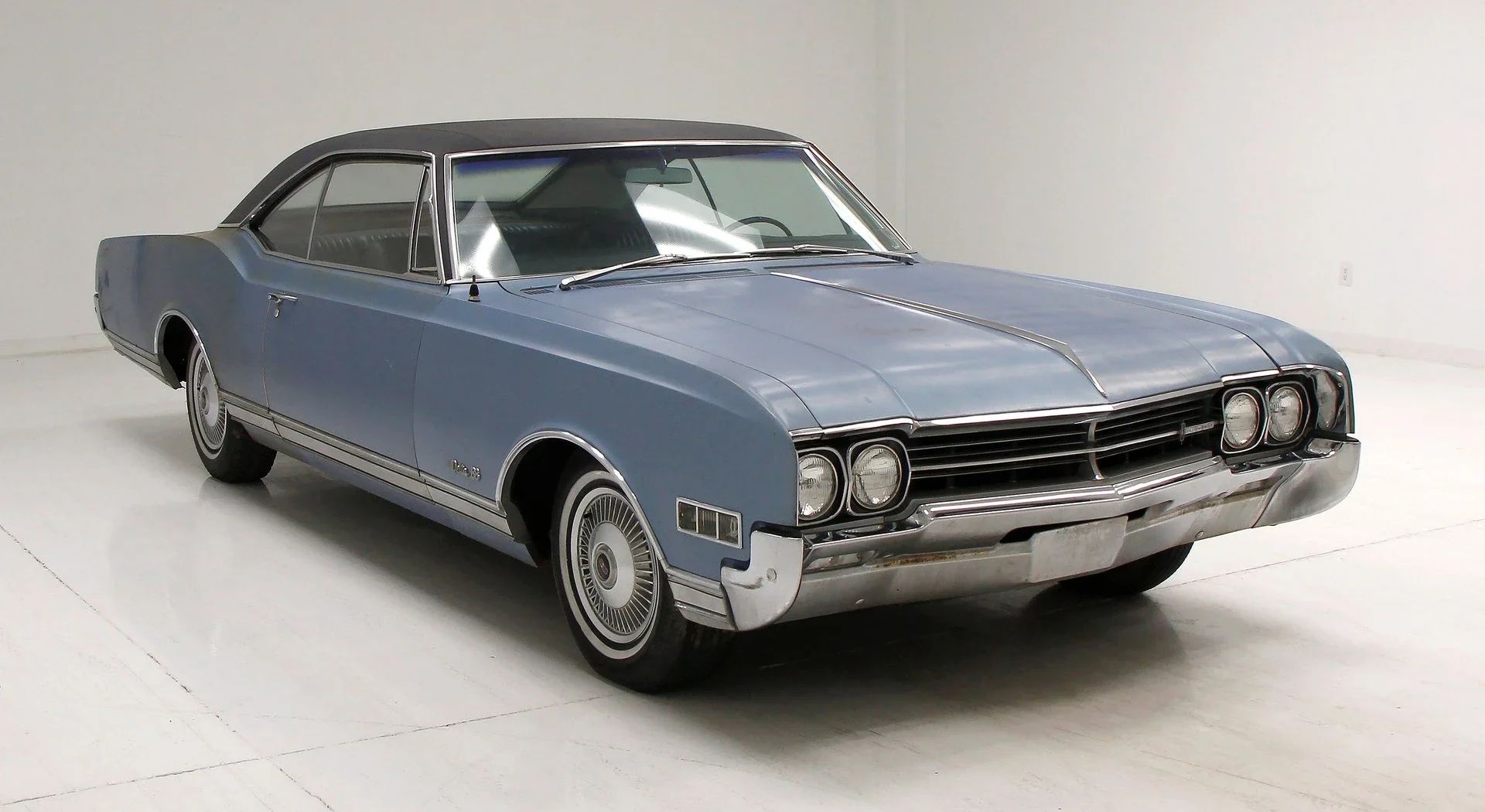 1966 Oldsmobile Starfire: The Last Full-Size Starfire, Lost In the Shadow Of The Toronado 9 Right front 3q view of a 1966 Oldsmobile in an indoor studio space