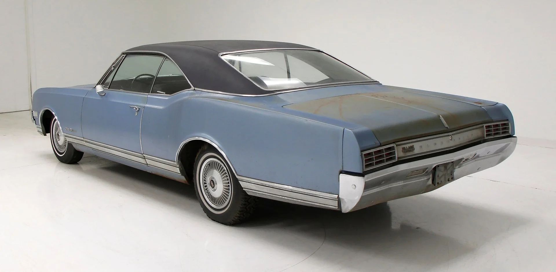 1966 Oldsmobile Starfire: The Last Full-Size Starfire, Lost In the Shadow Of The Toronado 10 Left rear 3q view of a 1966 Oldsmobile in an indoor studio space