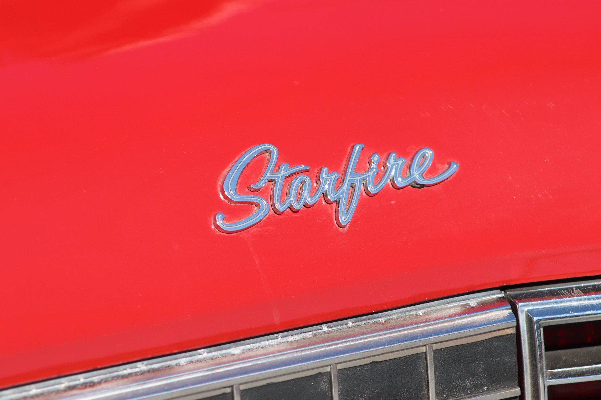 1966 Oldsmobile Starfire: The Last Full-Size Starfire, Lost In the Shadow Of The Toronado 2 Starfire badge on a red car