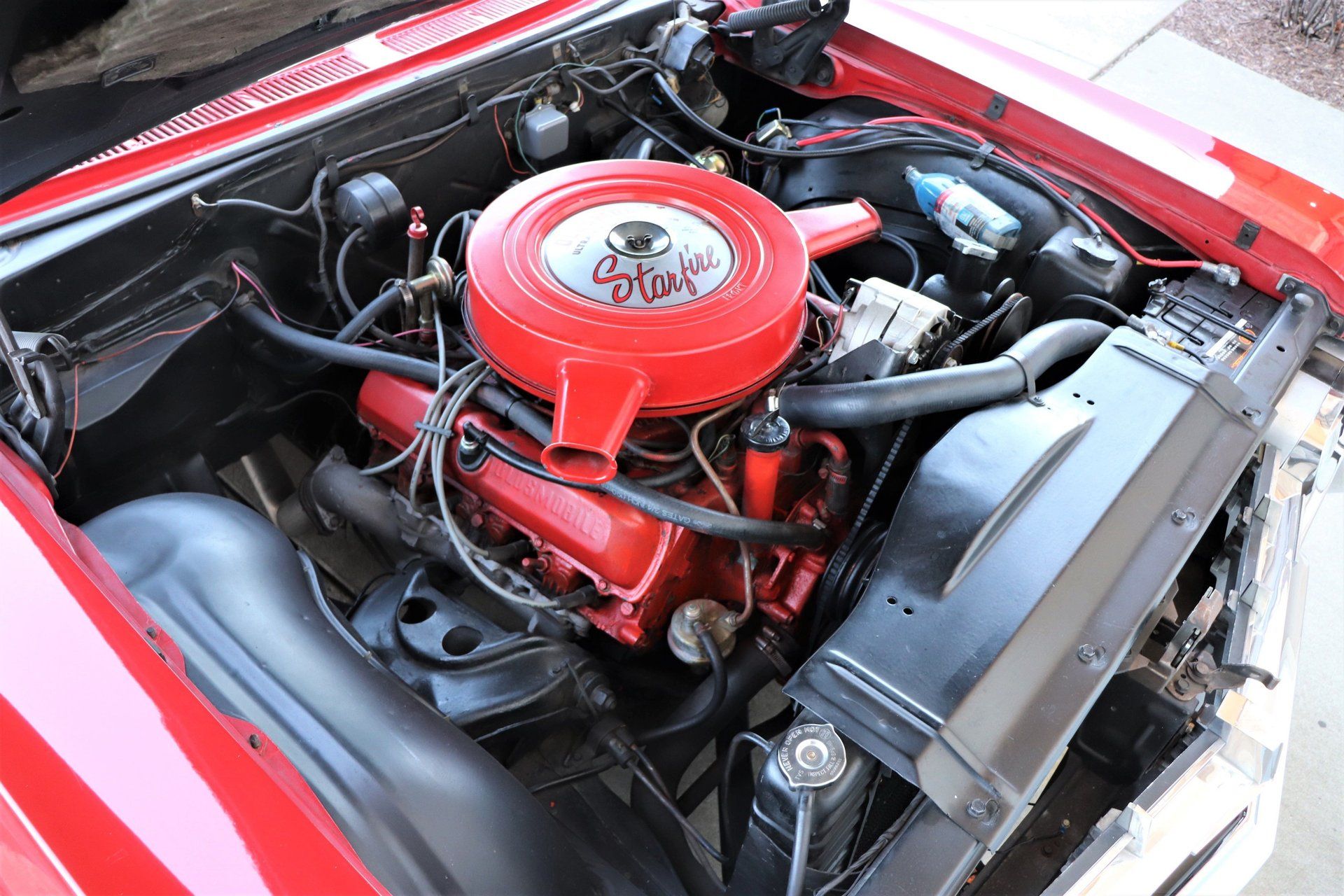 1966 Oldsmobile Starfire: The Last Full-Size Starfire, Lost In the Shadow Of The Toronado 13 Oldsmobile V-8 in a 1966 Starfire, seen from the left