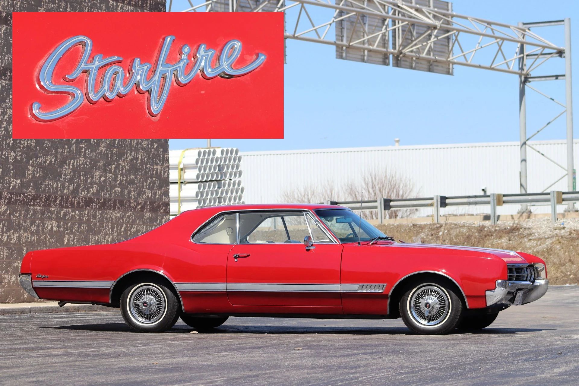 1966 Oldsmobile Starfire: The Last Full-Size Starfire, Lost In the Shadow Of The Toronado 1 Right front 3q view of a Target Red 1966 Oldsmobile Starfire two-door hardtop with an inset closeup of the Starfire badge