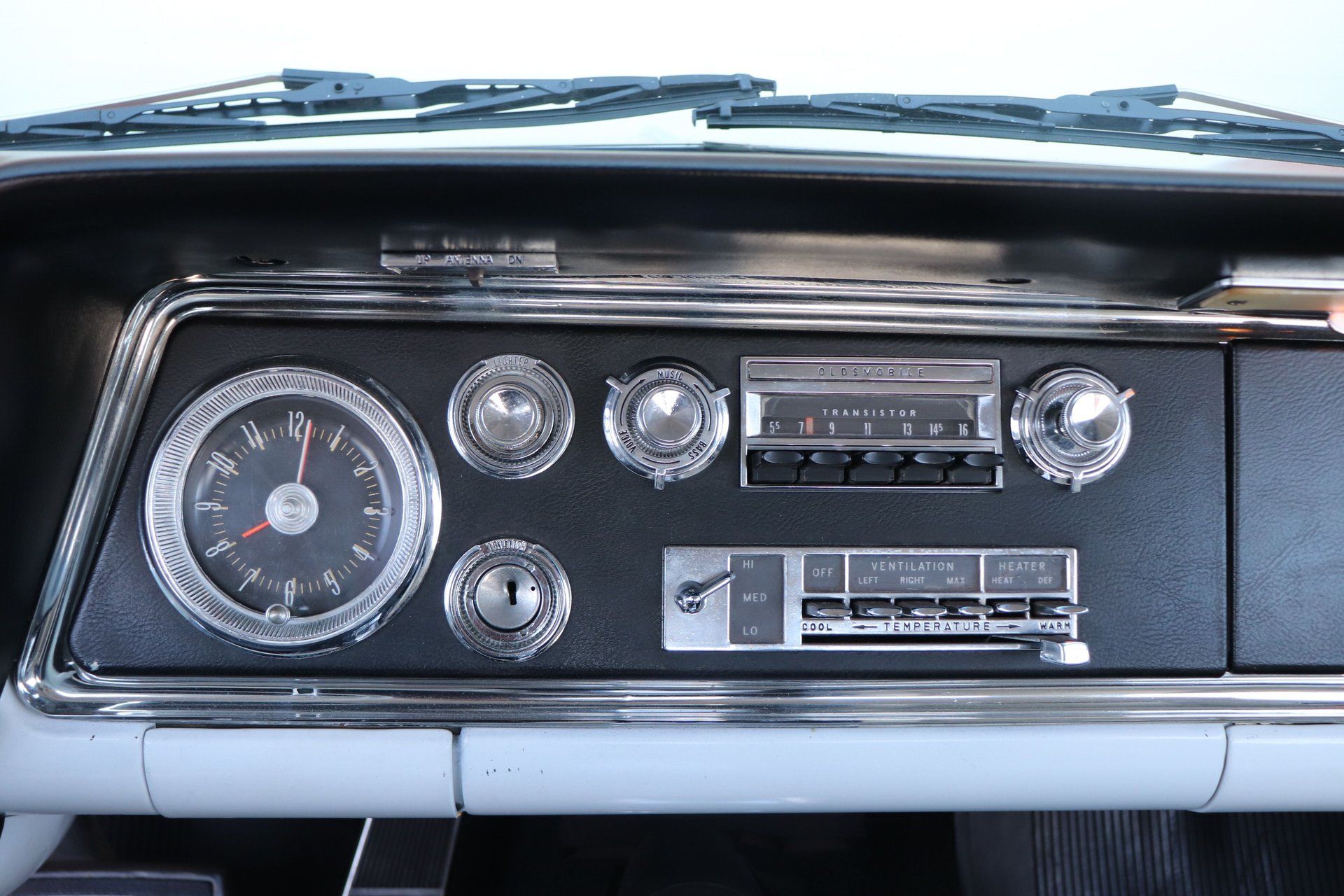 1966 Oldsmobile Starfire: The Last Full-Size Starfire, Lost In the Shadow Of The Toronado 18 Clock, radio, and HVAC controls in a 1966 Oldsmobile
