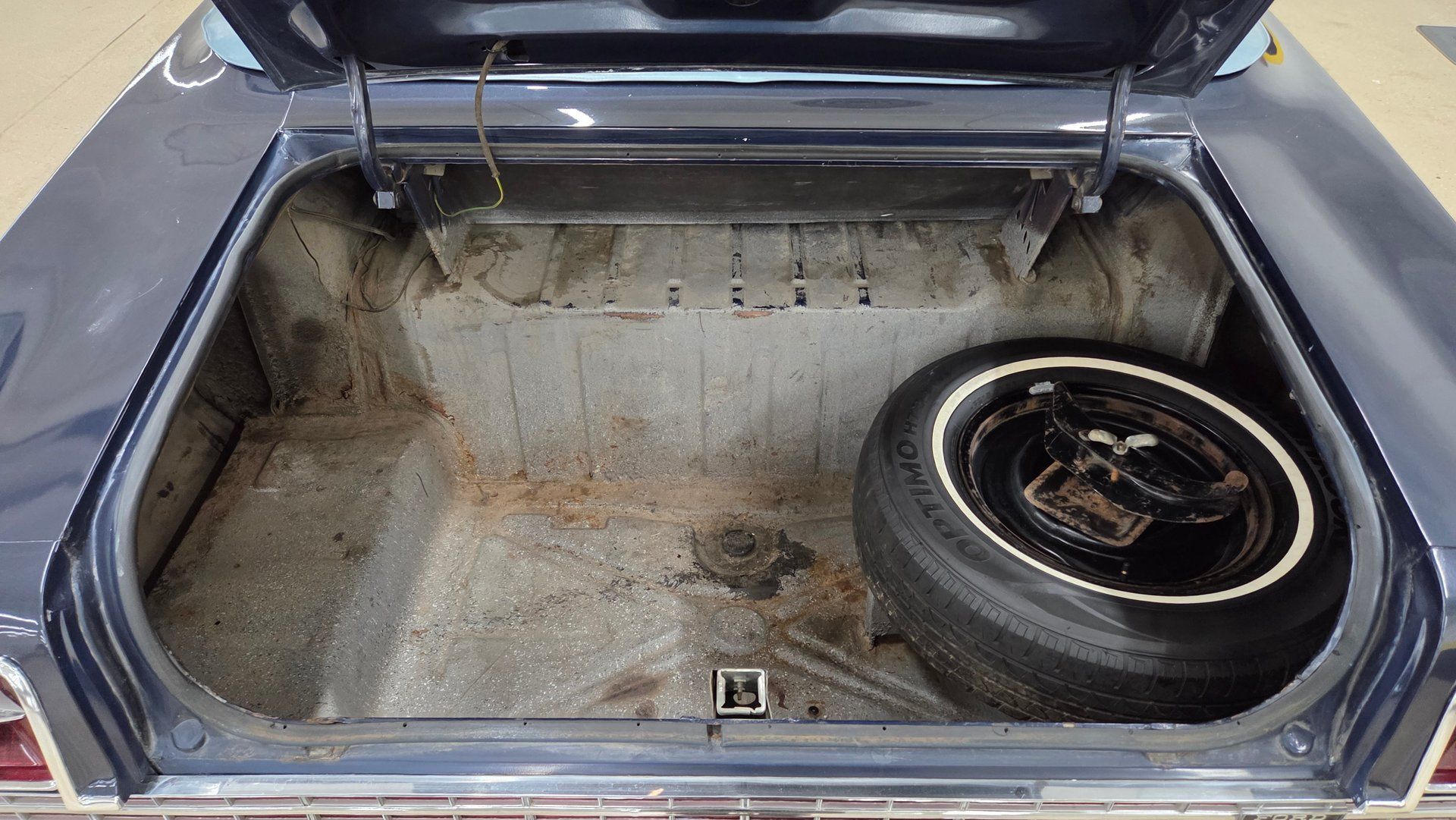 Luggage compartment of dark blue 1969 Ford XL Convertible