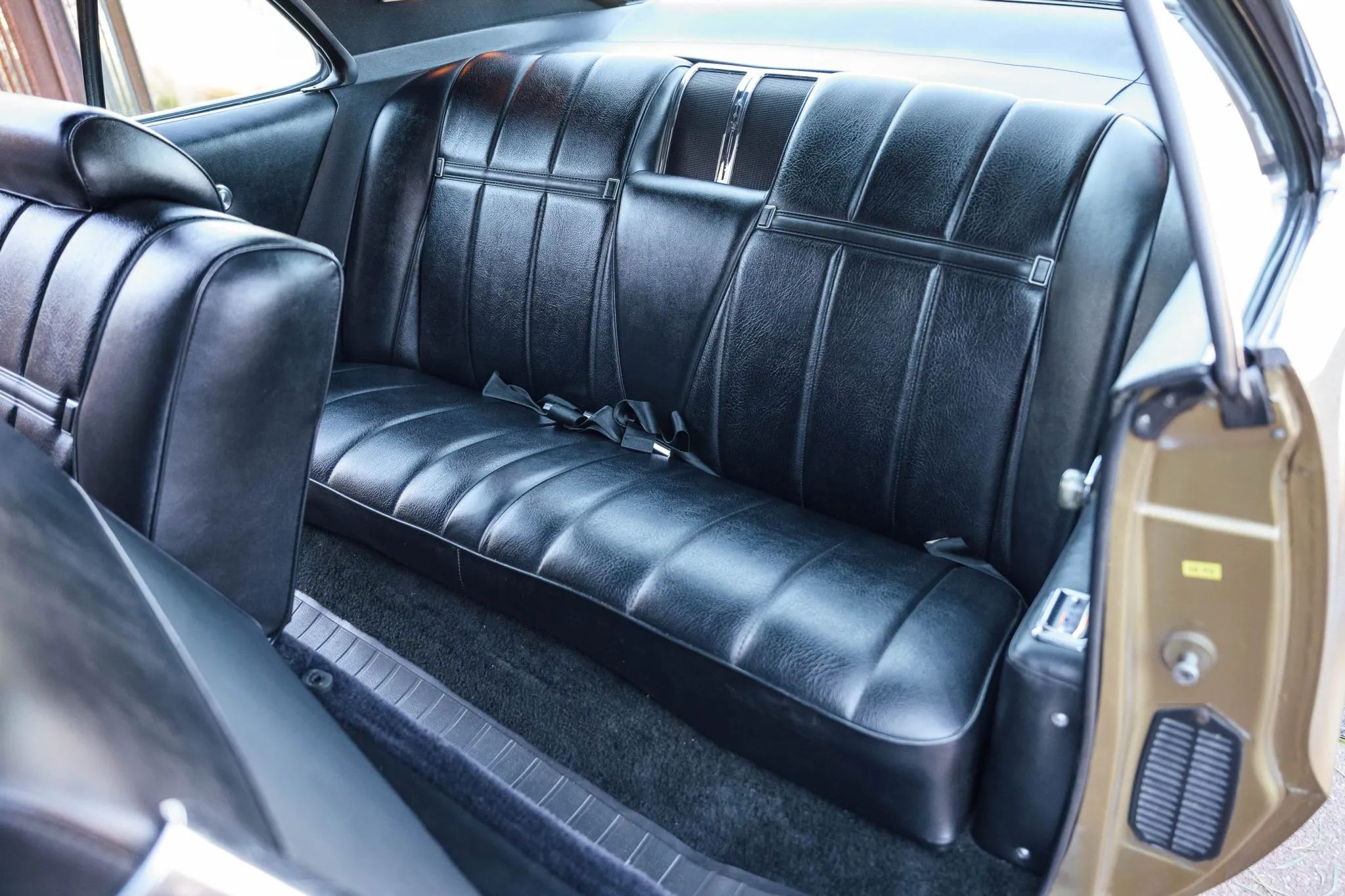 1970 Oldsmobile Toronado GT: 400 Horsepower And A Face Only A Mother Could Love 28 Back seat of a 1970 Toronado, seen from the driver's door