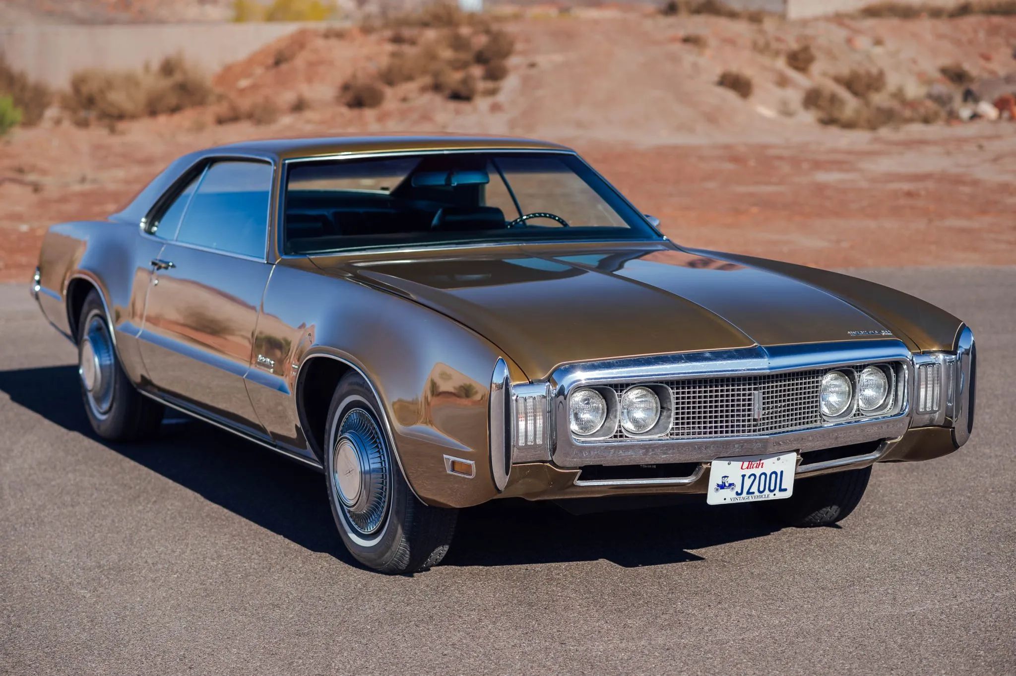 1970 Oldsmobile Toronado GT: 400 Horsepower And A Face Only A Mother Could Love 1 Right front 3q view of a Burnished Gold 1970 Oldsmobile Toronado