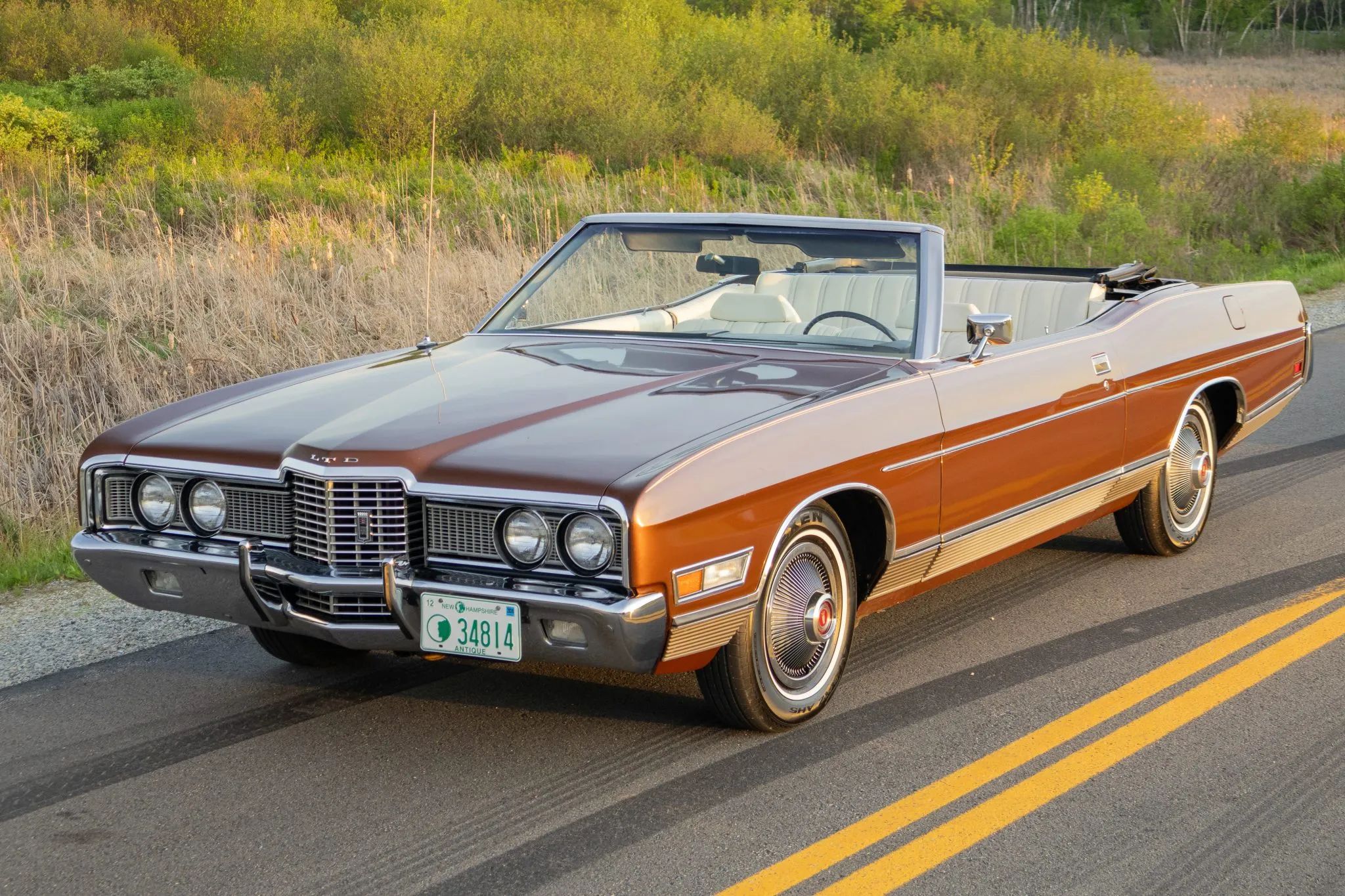 1972 Ford LTD Convertible: Final Year For The Factory-Built Full-Size Ford Ragtop 1 High-angle left front 3q view of a Ginger Glow 1972 Ford LTD convertible with the top down on a two-lane road