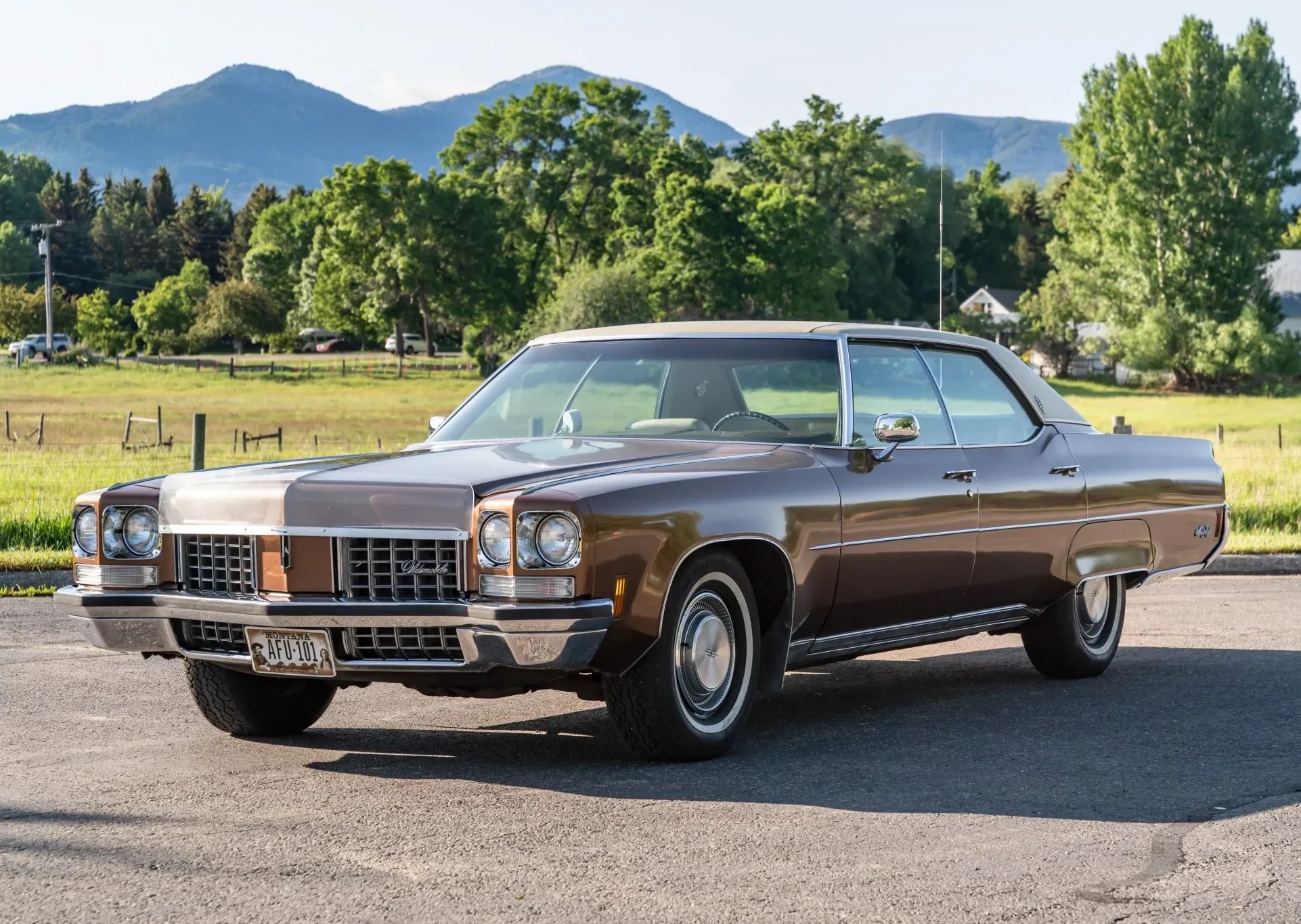 1972 Oldsmobile Ninety-Eight Luxury Sedan: A Full-Size Luxury Bargain From Big Sky Country 3 Left front 3q view of a 1972 Oldsmobile four-door hardtop with a bug deflector above the grille