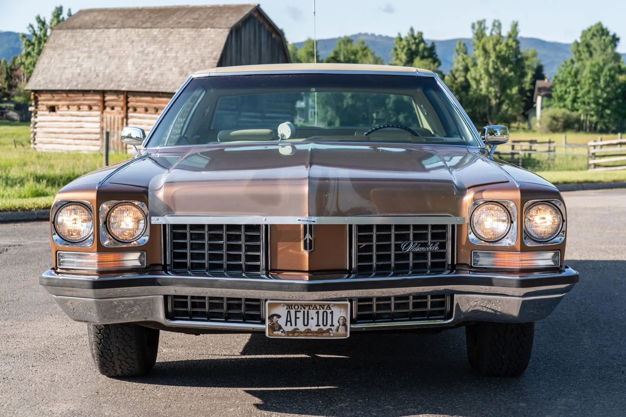 1972 Oldsmobile Ninety-Eight Luxury Sedan: A Full-Size Luxury Bargain From Big Sky Country 8 Front view of a 1972 Oldsmobile with a bug deflector above the grille