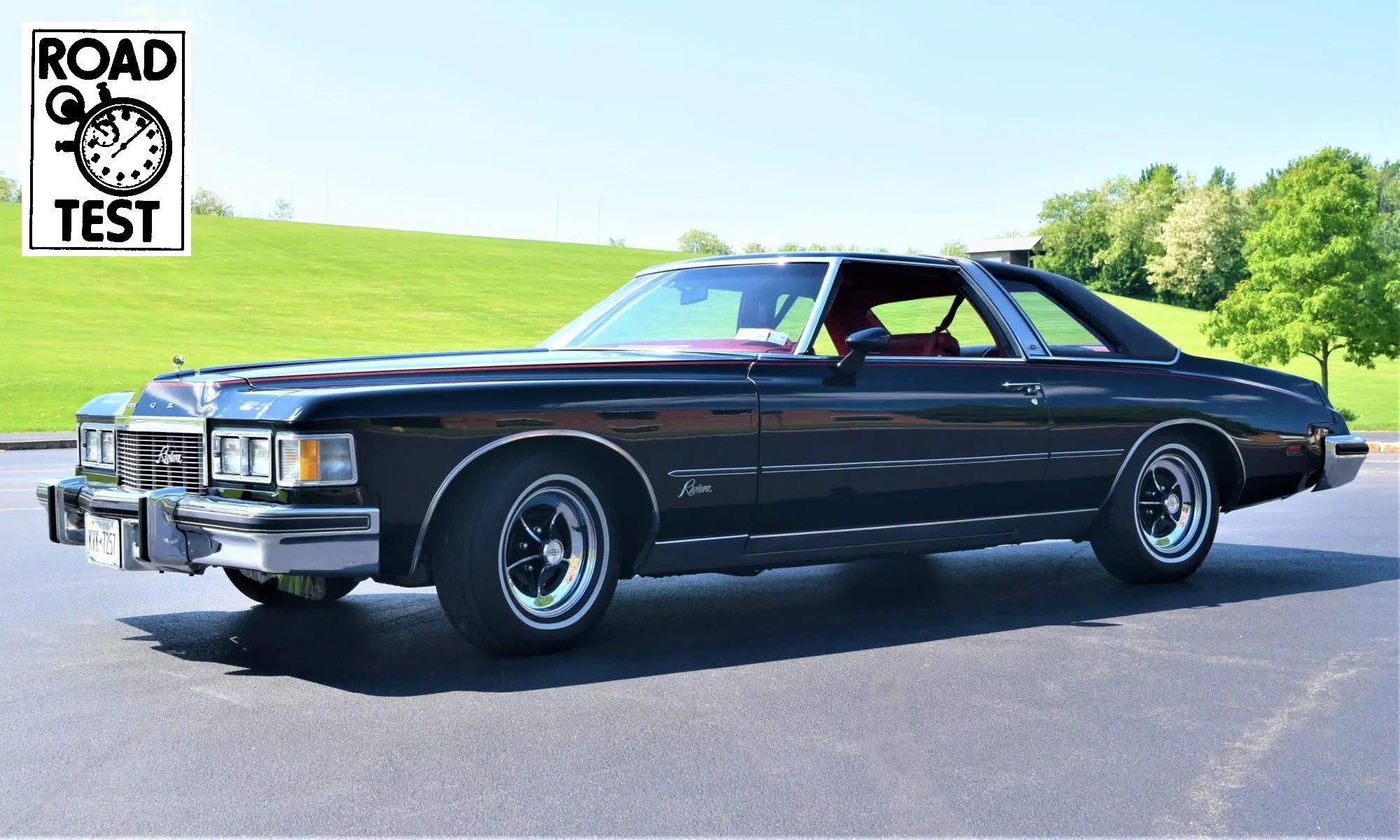 Vintage Review: 1976 Buick Riviera – "Once Big, Flashy, Fast And Unique, It Is Now Simply Big" 1 Left front 3q view of a black 1976 Buick Riviera with a "Road Test" graphic in the upper left corner