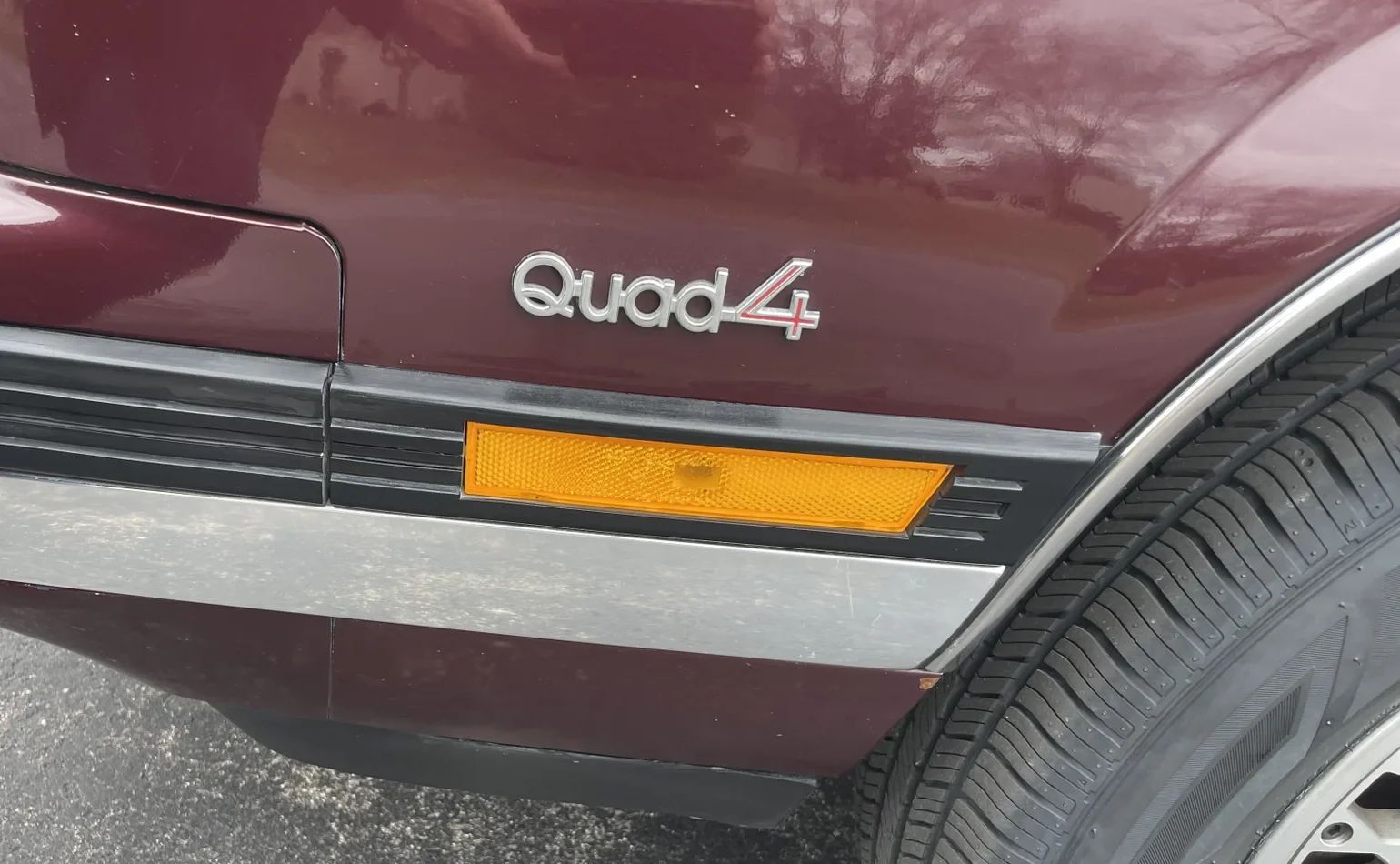 1988 Oldsmobile Cutlass Calais With Quad 4 And Rare 5-Speed: "A Heady Blend of High Revs and Haut Velour" 26 Quad 4 badge on the left front fender of a 1988 Oldsmobile N-body Calais