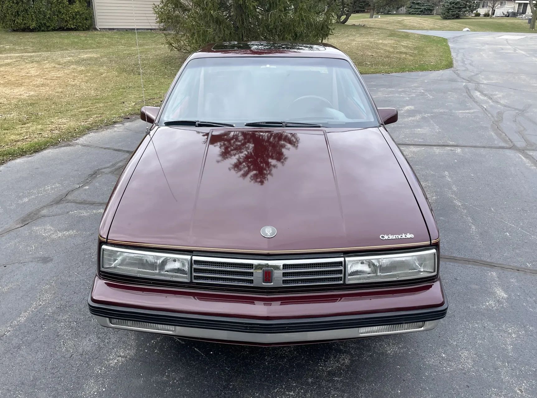 1988 Oldsmobile Cutlass Calais With Quad 4 And Rare 5-Speed: "A Heady Blend of High Revs and Haut Velour" 8 High-angle front view of a 1988 Oldsmobile N-body Calais