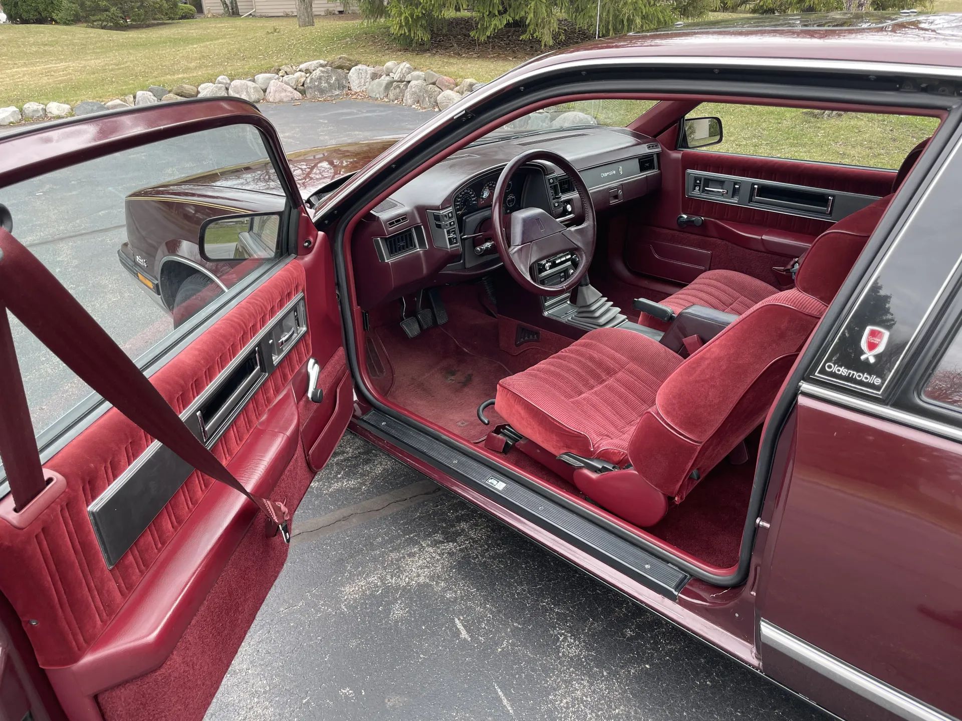 1988 Oldsmobile Cutlass Calais With Quad 4 And Rare 5-Speed: "A Heady Blend of High Revs and Haut Velour" 25 Interior and driver's door of a 1988 Oldsmobile N-body Calais, seen from the left side