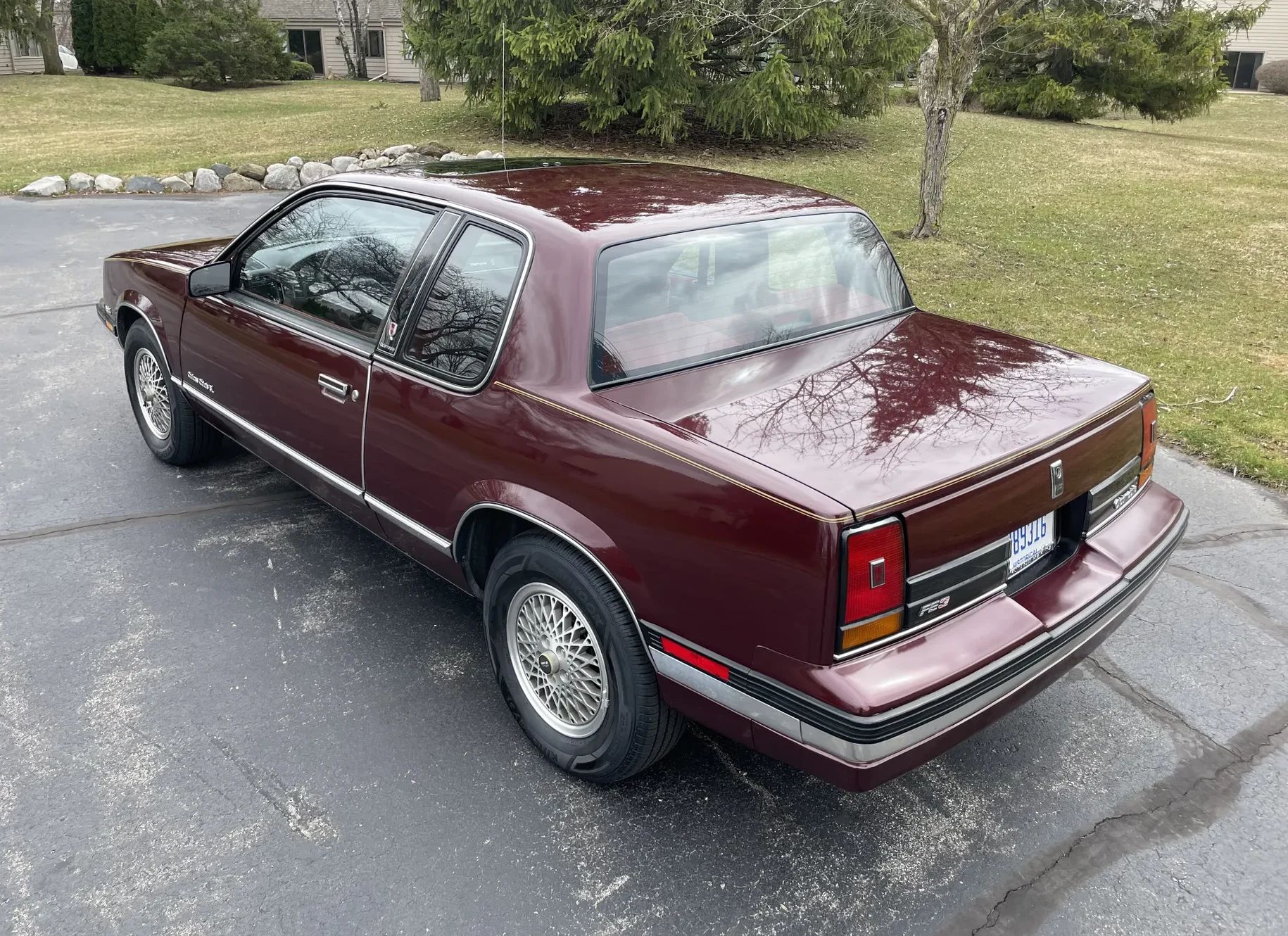 1988 Oldsmobile Cutlass Calais With Quad 4 And Rare 5-Speed: "A Heady Blend of High Revs and Haut Velour" 24 High-angle left rear 3q view of a 1988 Oldsmobile N-body Calais