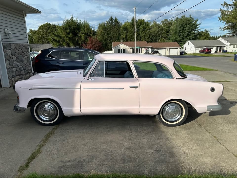1960 Rambler American Super: A Cute And Fairly Inexpensive Way To Draw Attention 1 Driver side profile of pink 1960 Rambler American Super