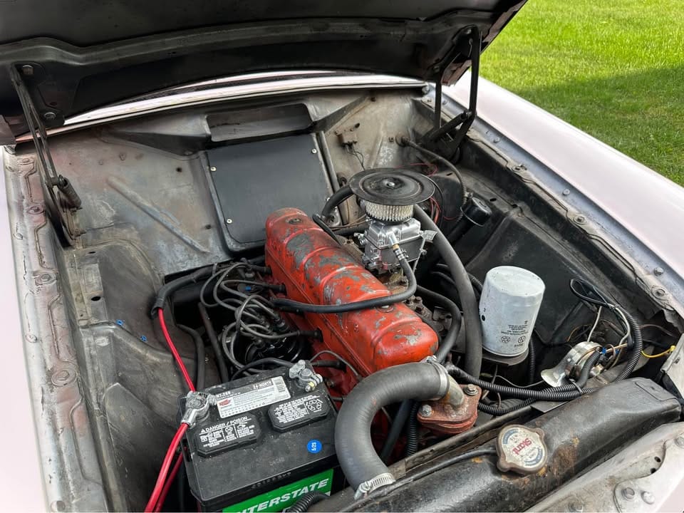 1960 Rambler American Super: A Cute And Fairly Inexpensive Way To Draw Attention 2 Engine compartment of pink 1960 Rambler American Super with non-stock overhead-valve six-cylinder engine