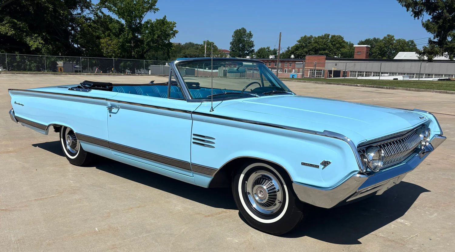 Passenger front 3q picture of light blue 1964 Mercury Monterey Convertible