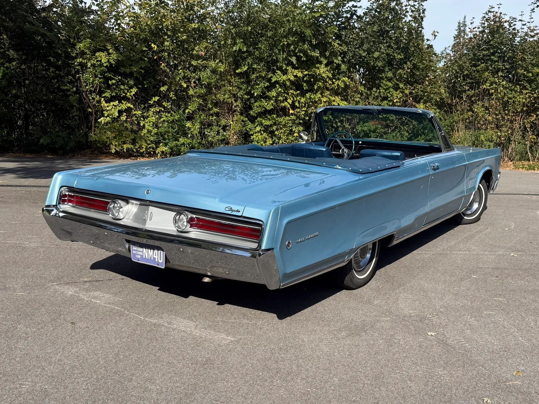 1968 Chrysler 300 Convertible: The Last Stop Before The Fuselage Chrysler 8 Passenger rear 3q picture of blue 1968 Chrysler 300 Convertible parked in front of trees