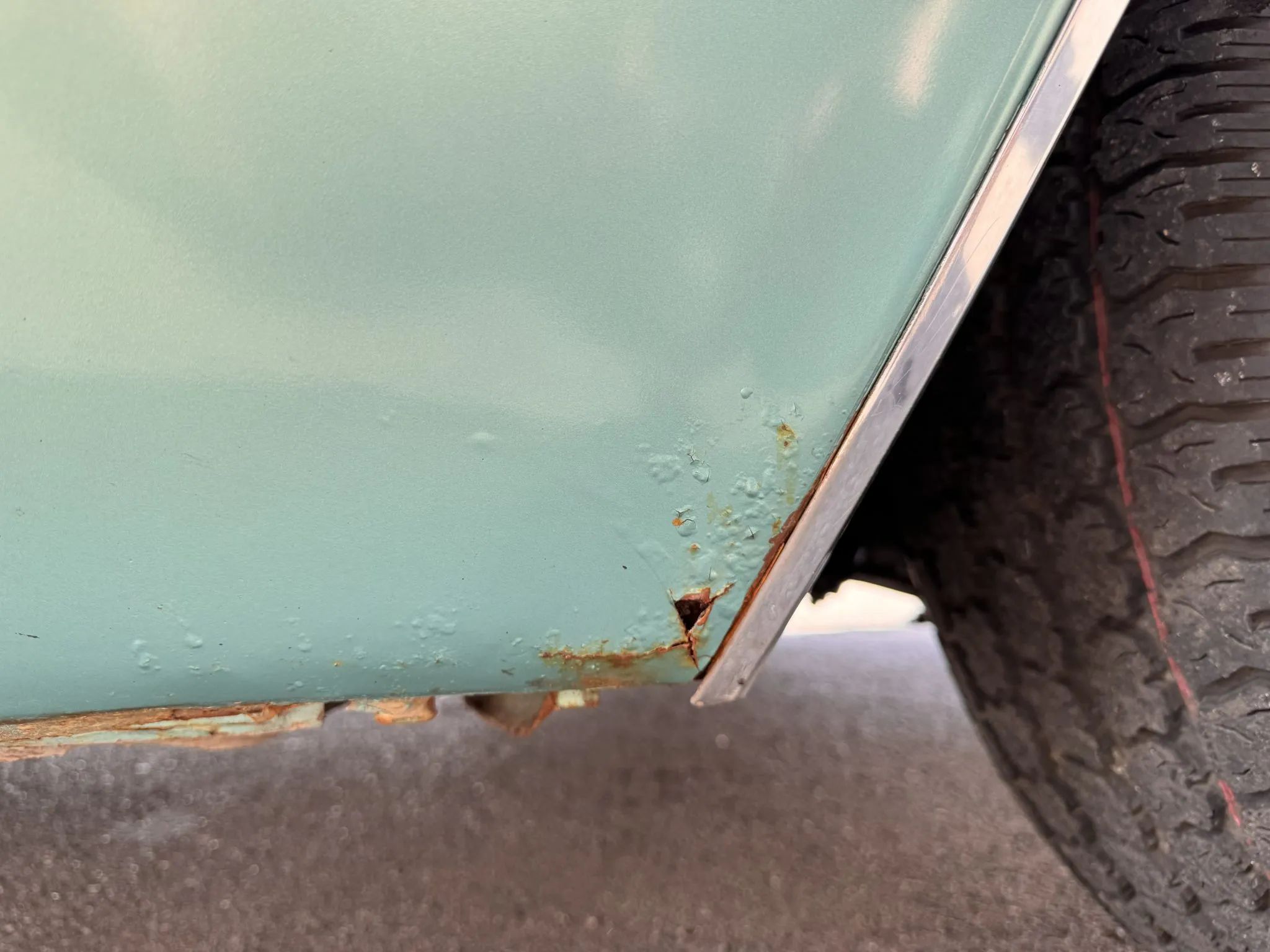 Small rust spot on turquoise 1970 Cadillac Calais Coupe