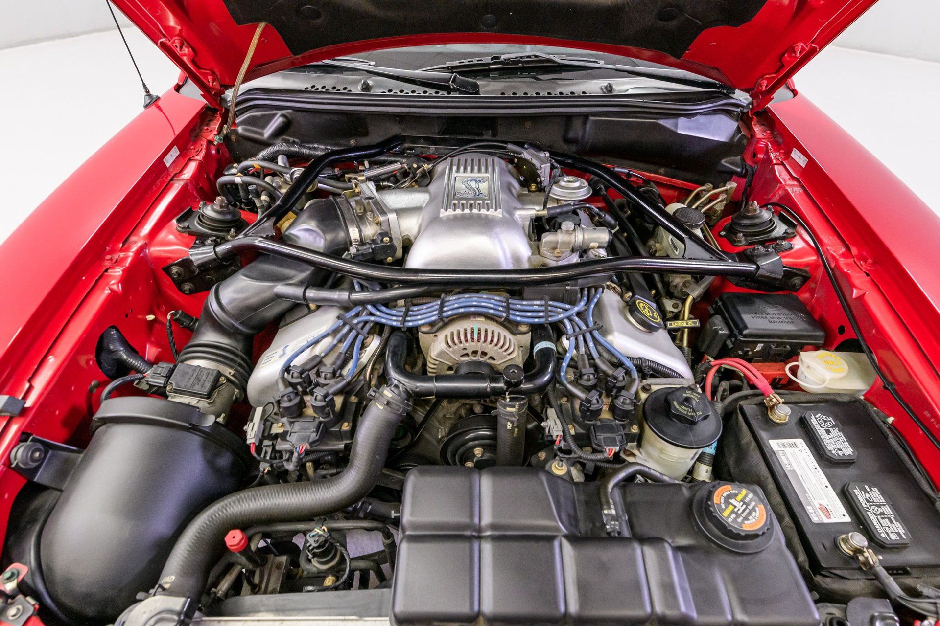 1997 Ford Mustang engine compartment with 4.6-liter dual-overhead-cam V8 engine